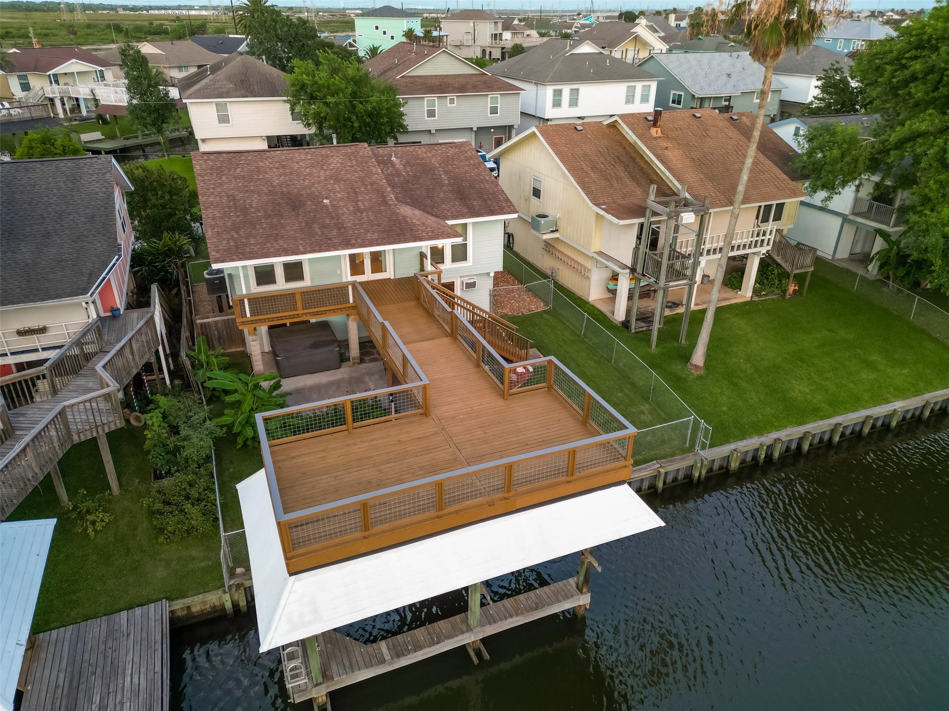 4 N Sandpiper Street, La Marque, TX 77568 Beautiful new deck overlooking the water.