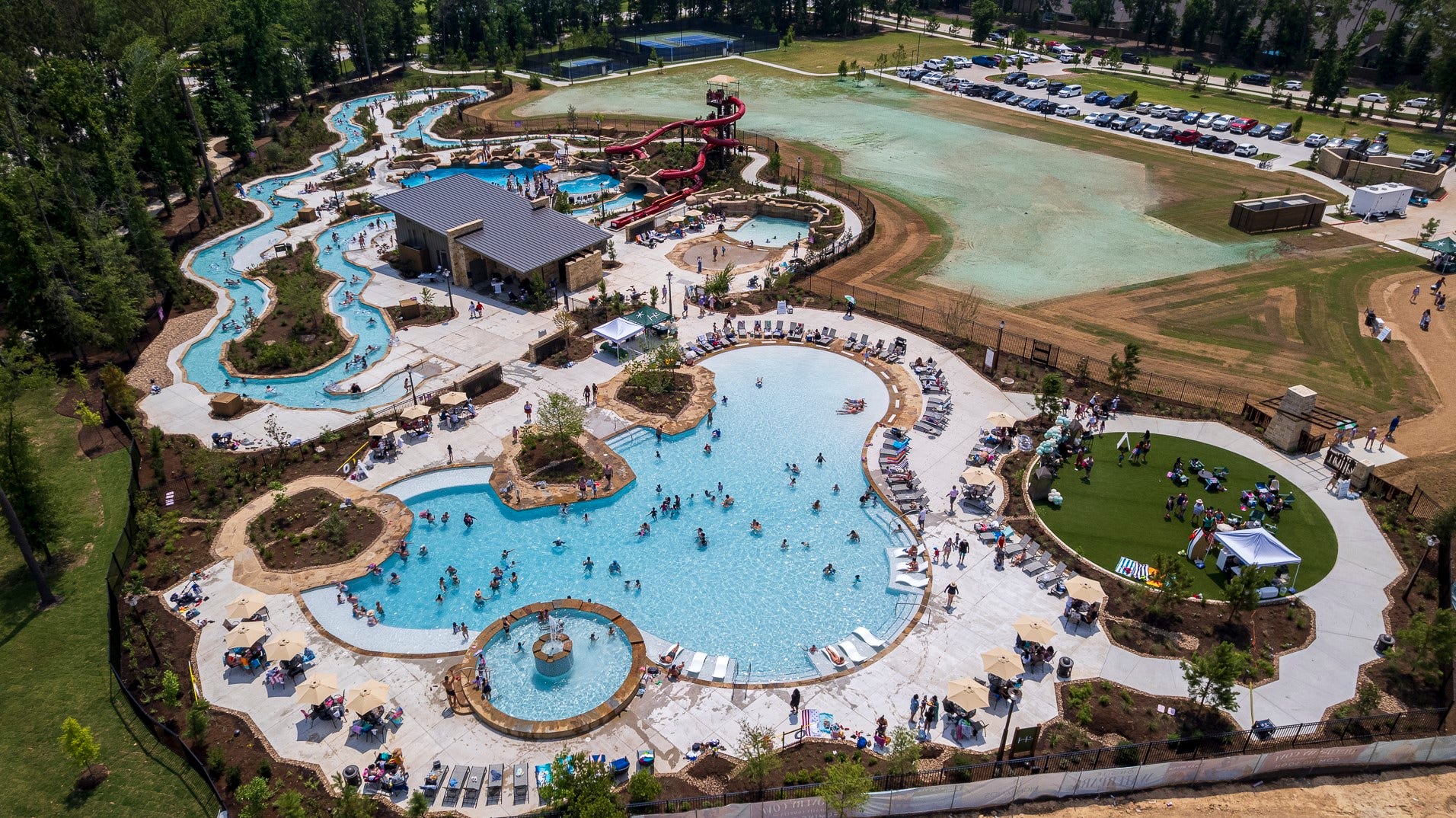 21845 Golden Putt Drive, Porter, TX 77365 Make a splash at Discovery Covethe brand-new resort-style pool in The Highlands. Featuring waterslides, splash zones, and plenty of lounge space, its the ultimate destination for fun and relaxation.