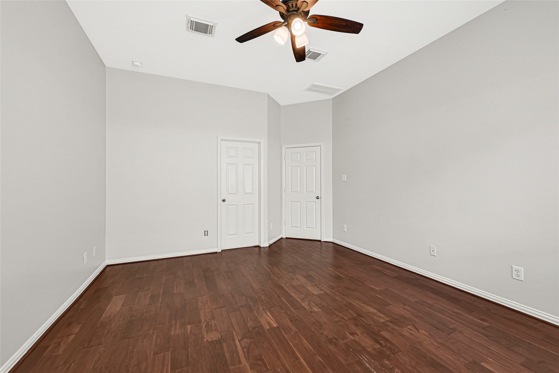 2910 Crescent Oaks Park Lane, Spring, TX 77386 Light-filled primary suite with views and a private door leading to the en suite.