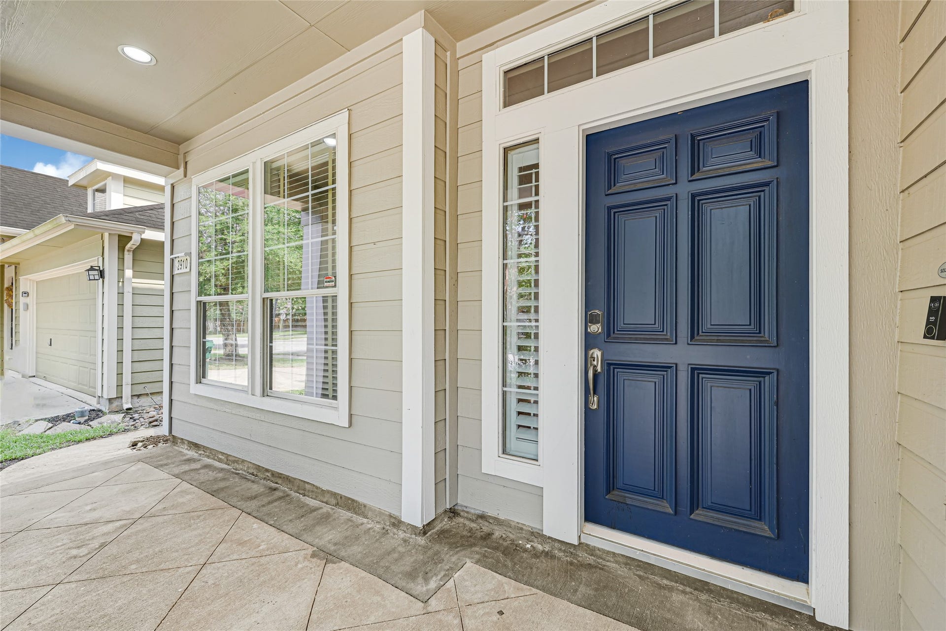 2910 Crescent Oaks Park Lane, Spring, TX 77386 Charming large front porch ideal for morning coffee or evening unwinding.