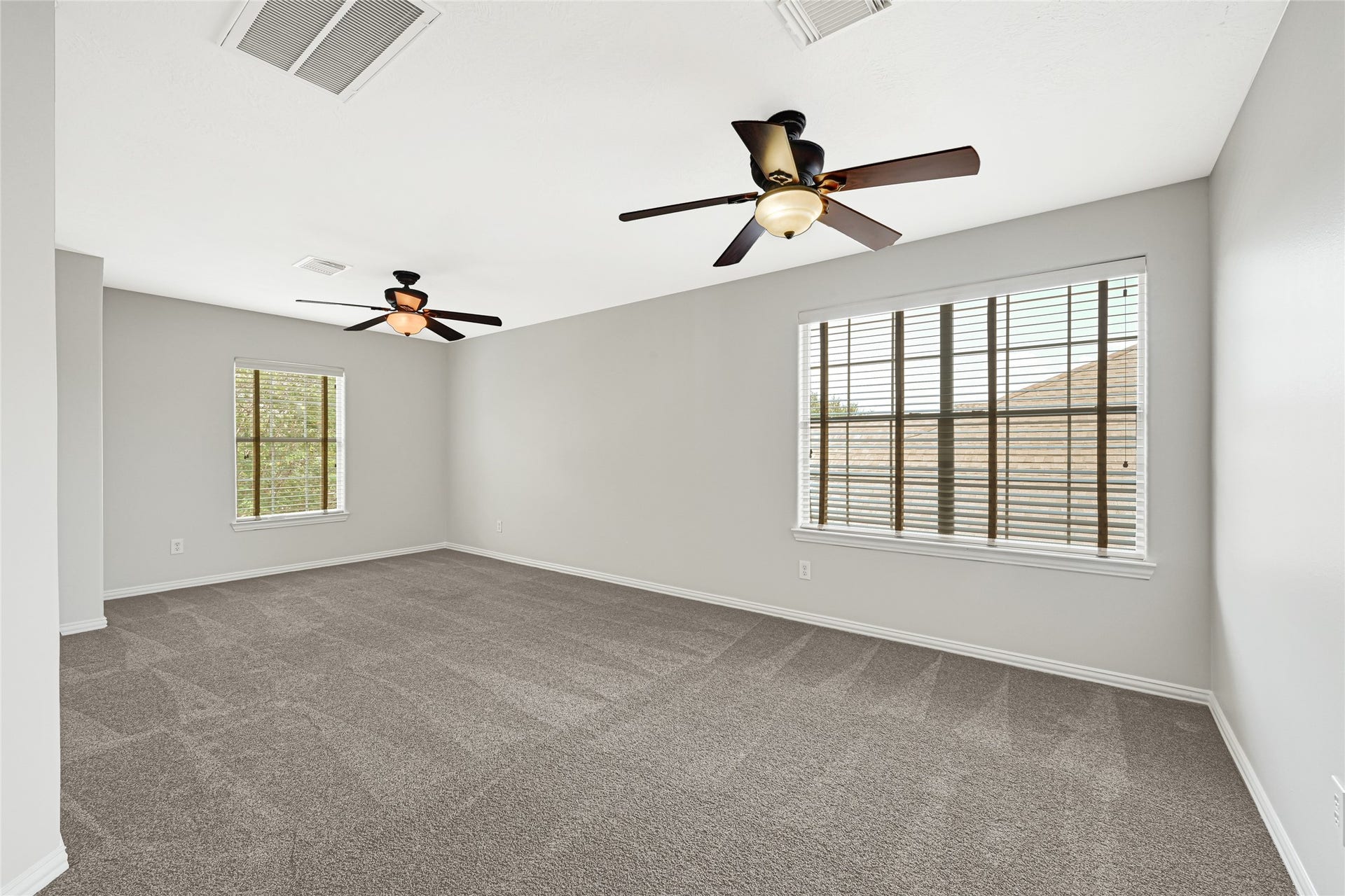 2910 Crescent Oaks Park Lane, Spring, TX 77386 Versatile second-floor bonus room ideal for games or movie nights.