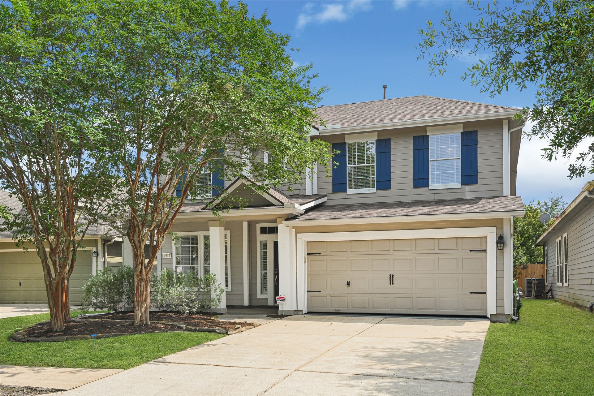 2910 Crescent Oaks Park Lane, Spring, TX 77386 Updated exterior with newly added roof and surrounding greenery.