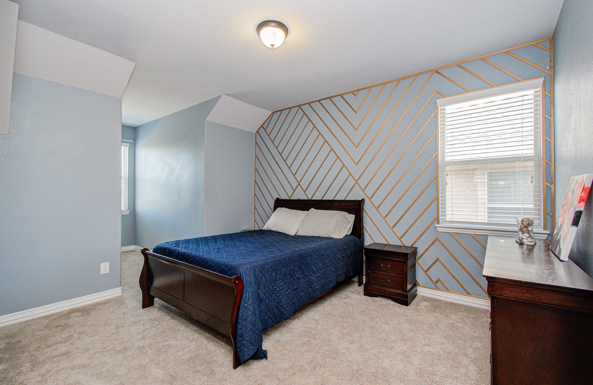 17915 Olde Oaks Estate Court, Cypress, TX 77433 3rd bedroom is spacious and feautes and accent wall and it's own study nook.