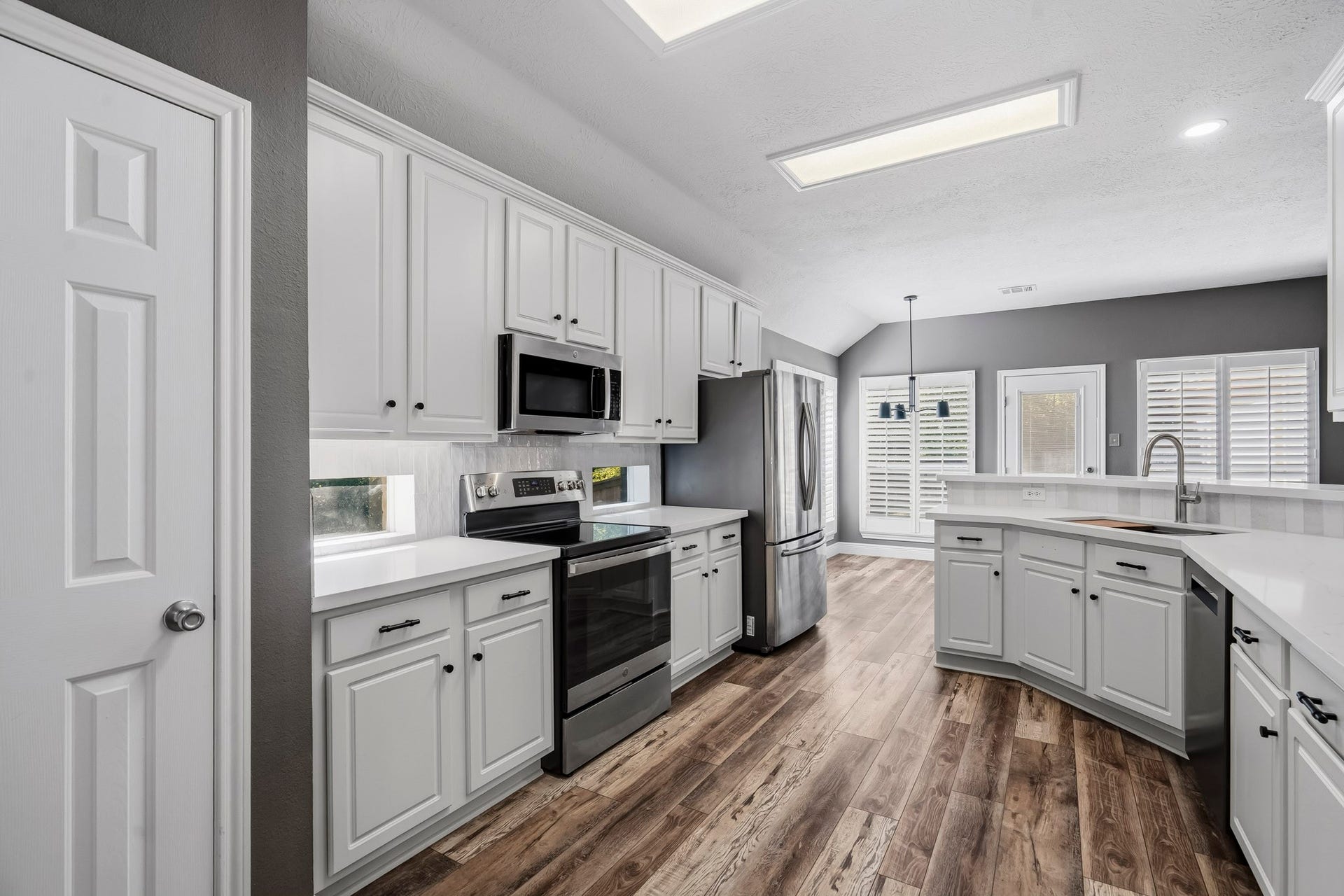 3622 Pedernales Trails Lane, Katy, TX 77450 Updated kitchen with excellent storage, quartz counters, new hardware and fixtures, recent appliances and designer backsplash.