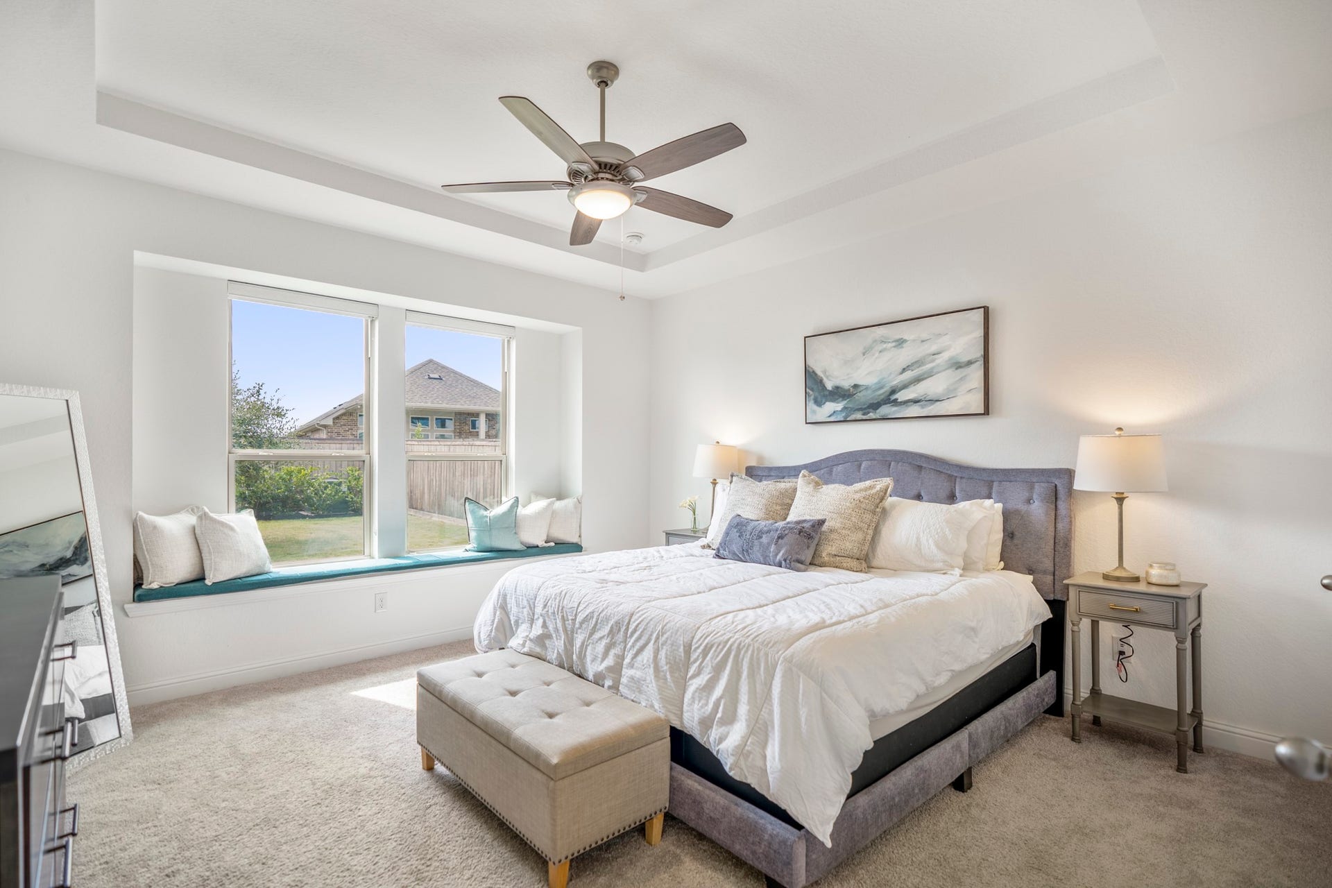 21723 Cordia Trace, Cypress, TX 77433 Tucked away on the first floor, the primary suite gives you a private retreat separate from the upstairs secondary bedrooms. A tray ceiling adds architectural interest without overwhelming the room.