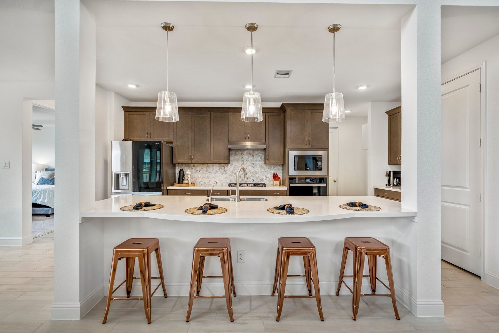 21723 Cordia Trace, Cypress, TX 77433 Pull up a chair! The extended counter creates additional seating without interrupting the kitchen workspacea perfect spot for morning coffee, quick meals or keeping the cook company.