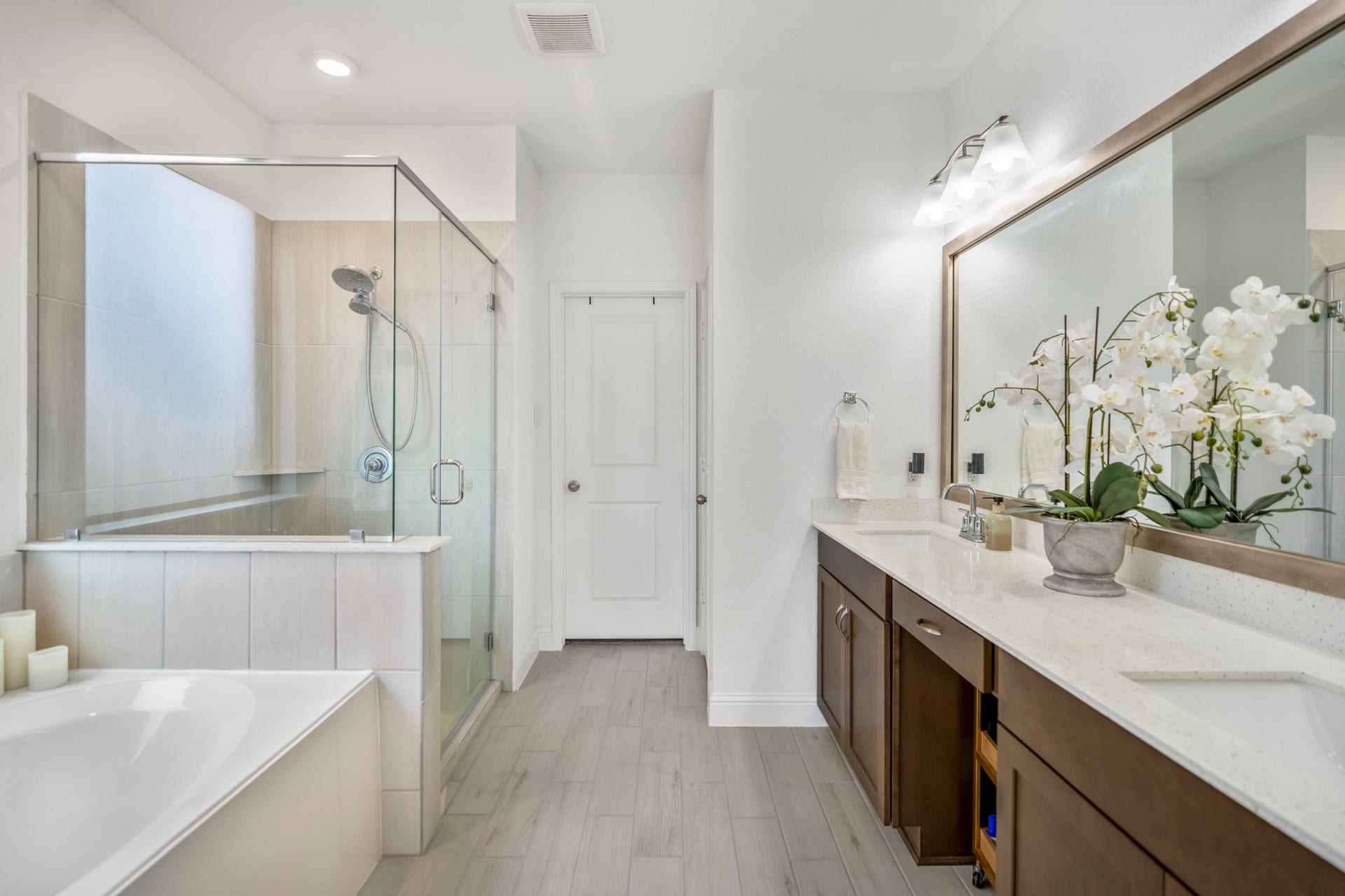 21723 Cordia Trace, Cypress, TX 77433 The primary bath gives you room to spread out with dual vanities, a soaking tub and separate showerno fighting for sink space in the morning.