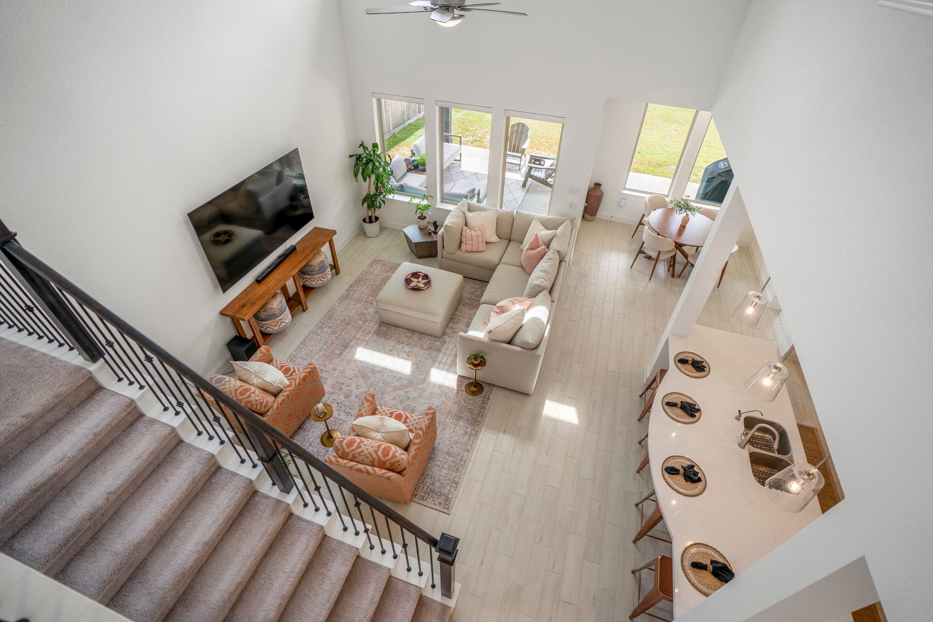 21723 Cordia Trace, Cypress, TX 77433 Turn around and you can see exactly why this floor plan works so well. The family room flows straight into the kitchen, so everyone can be together without being crowded into one space.