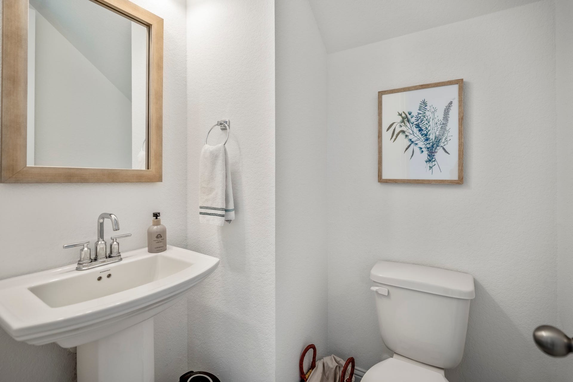 21723 Cordia Trace, Cypress, TX 77433 A well-placed powder bath adds everyday convenience to the main level while keeping the home's fresh, cohesive look.