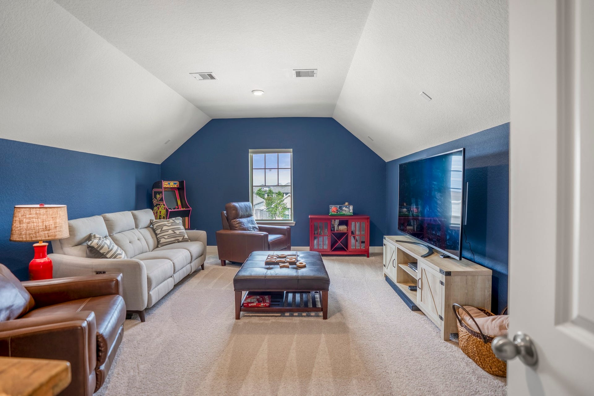 21723 Cordia Trace, Cypress, TX 77433 This might be one of the most useful spaces upstairs. The expansive media room is prewired for speakers and gives you room to create a true movie room, game room or second living area.