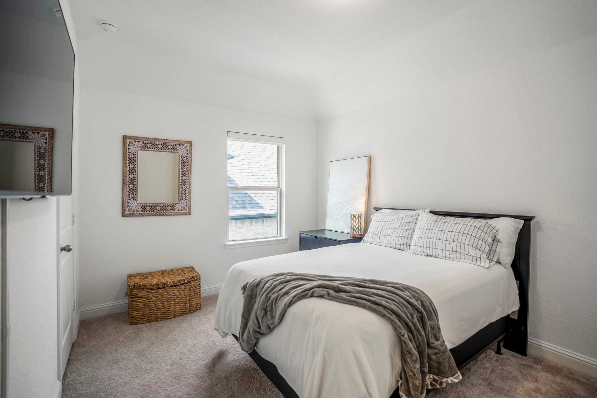 21723 Cordia Trace, Cypress, TX 77433 Neutral finishes make this room an easy blank canvas, while the window keeps the space bright and inviting.