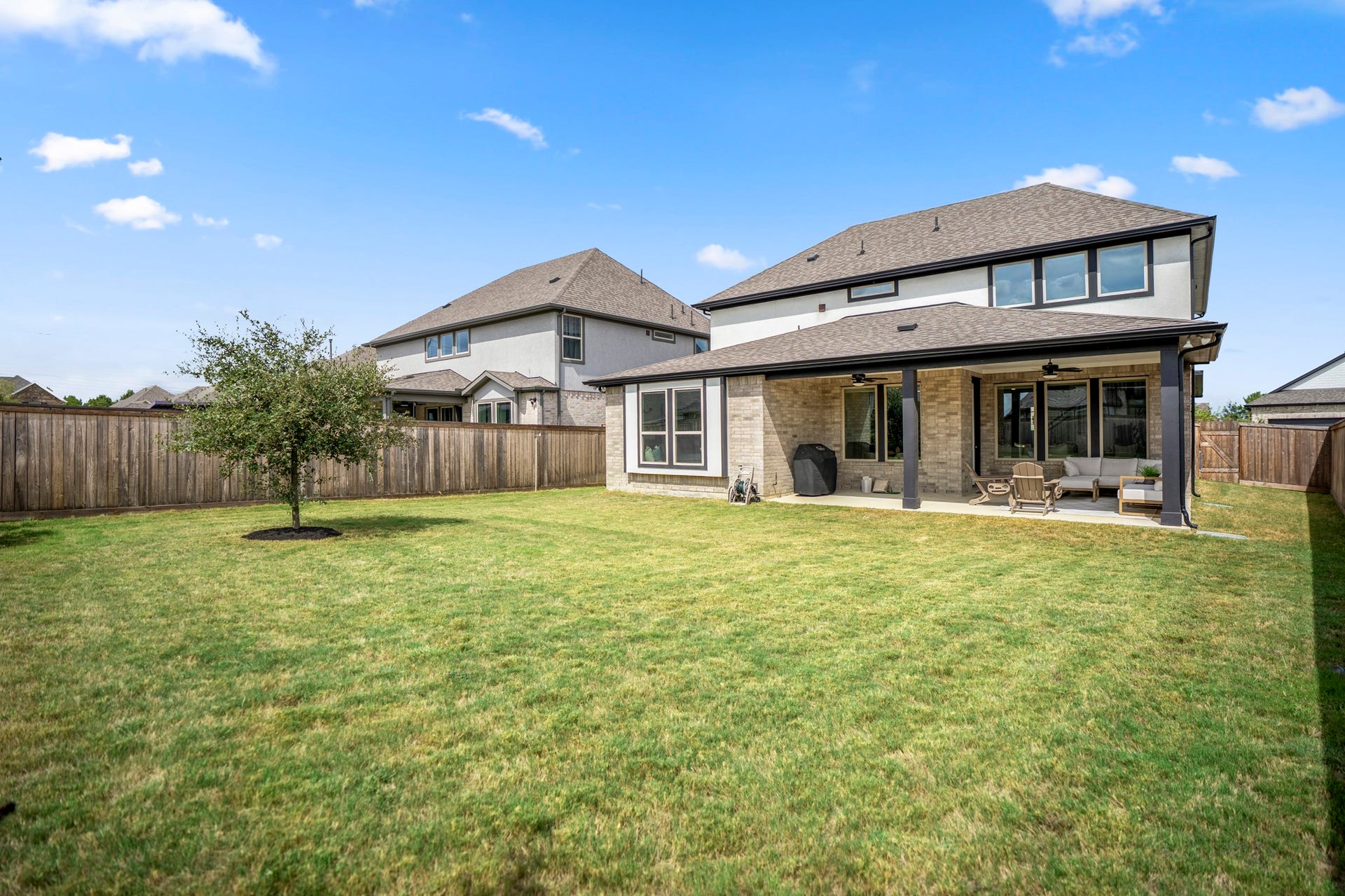 21723 Cordia Trace, Cypress, TX 77433 Step beyond the patio and look at the amount of green space still waiting for you. There's room for play equipment, pets, gardens, entertainingor to start sketching out that future pool.