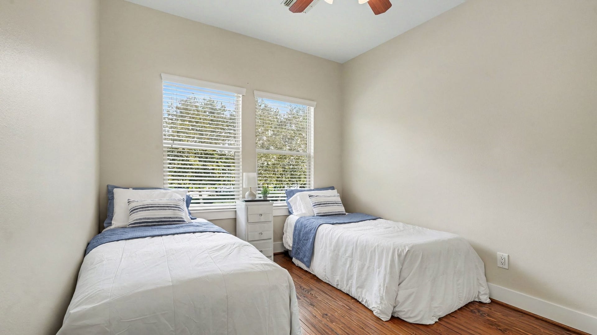 Third bedroom on second floor with ceiling fan and walk-in closet