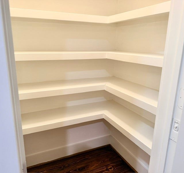 This fantastic walk-in pantry has plenty of space for everything you need