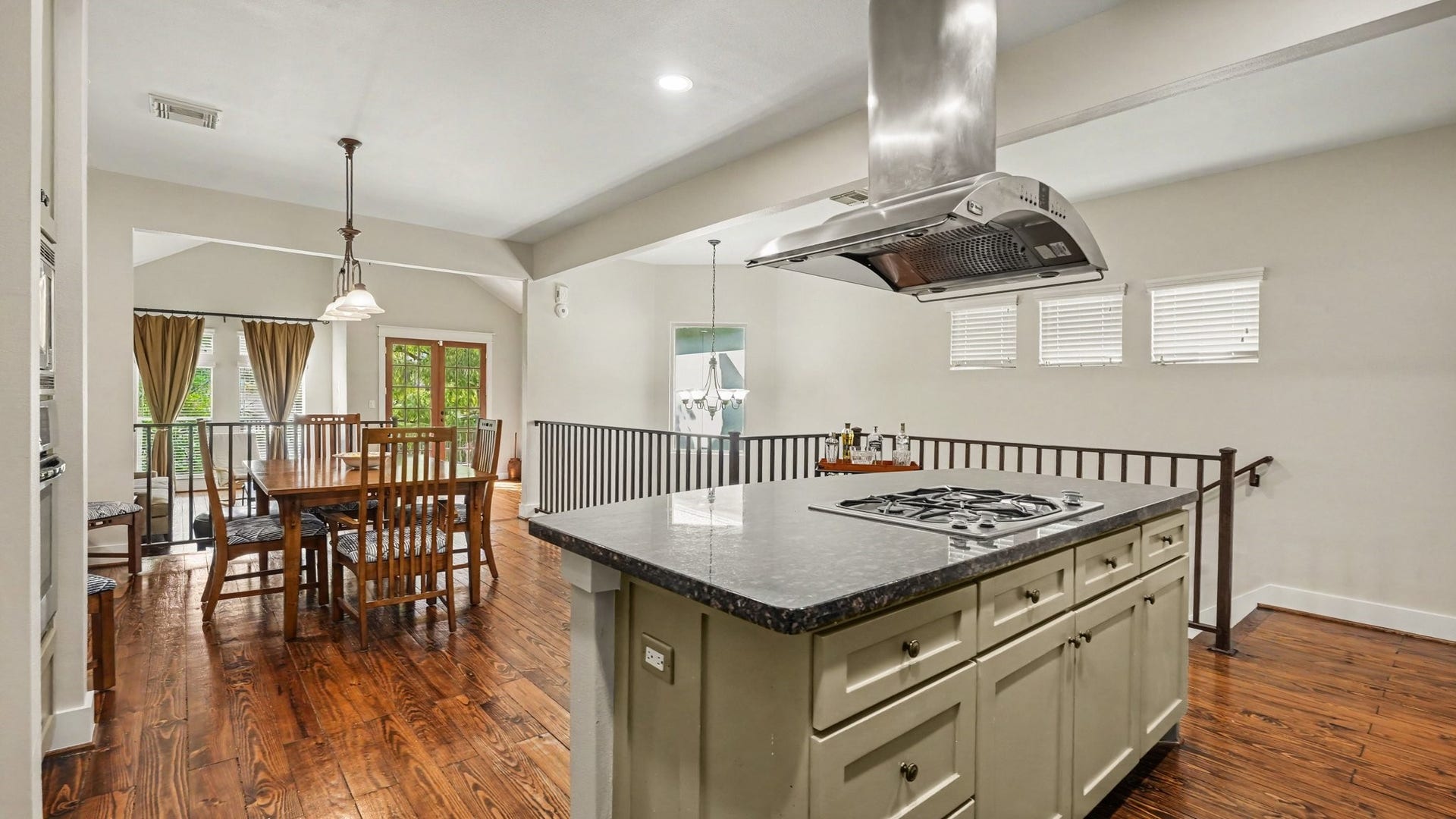 This view shows again how seamlessly the kitchen and dining room flow together, with the living room just beyond this floor plan is so inviting and open.