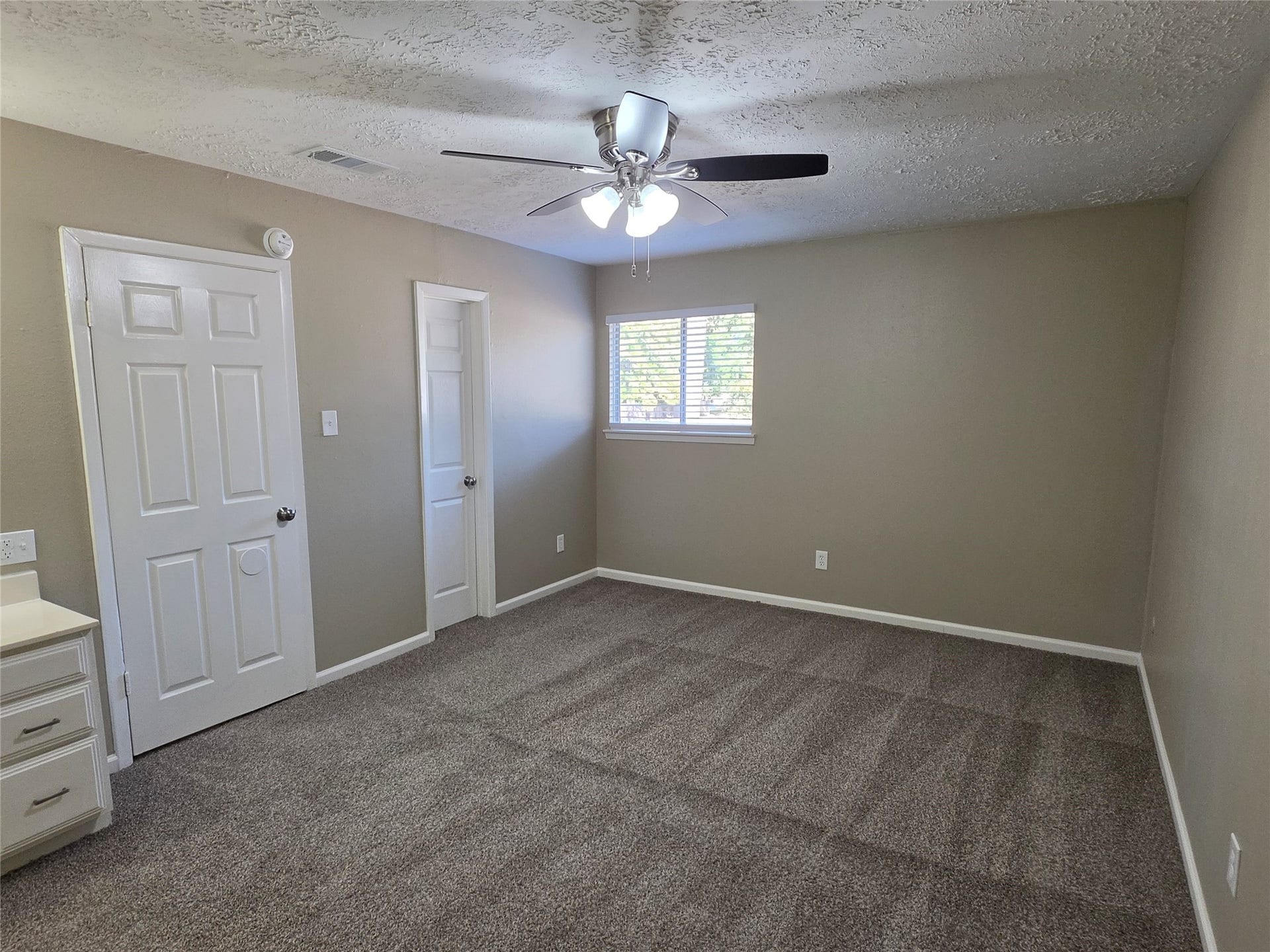 Another view of Primary Bedroom.