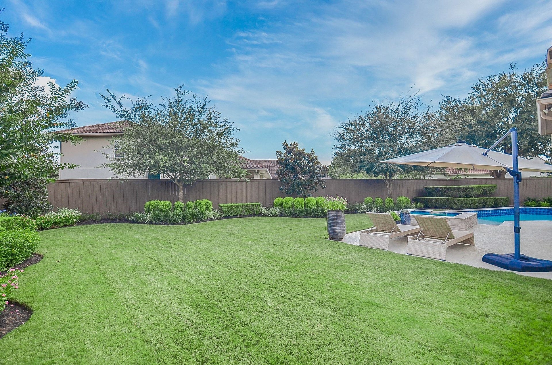86 Quiet Way Lane, Sugar Land, TX 77498 Relax beside the spa while taking in views of the beautifully landscaped backyard