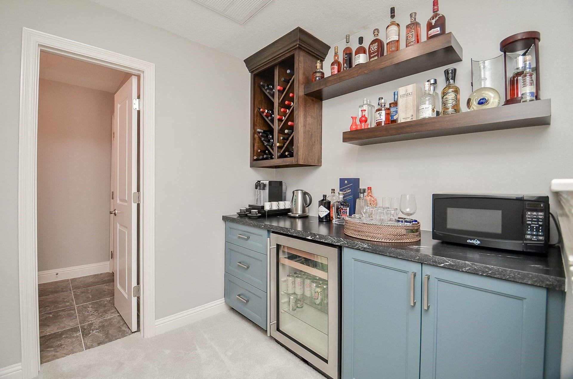 86 Quiet Way Lane, Sugar Land, TX 77498 This custom beverage / snack center makes entertaining easy. Perfect for game day to family movie night popcorn with everything you need at your fingertips.