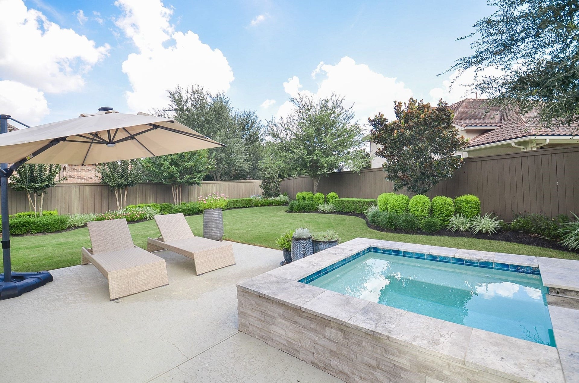 86 Quiet Way Lane, Sugar Land, TX 77498 Relax beside the spa while taking in views of the beautifully landscaped backyard