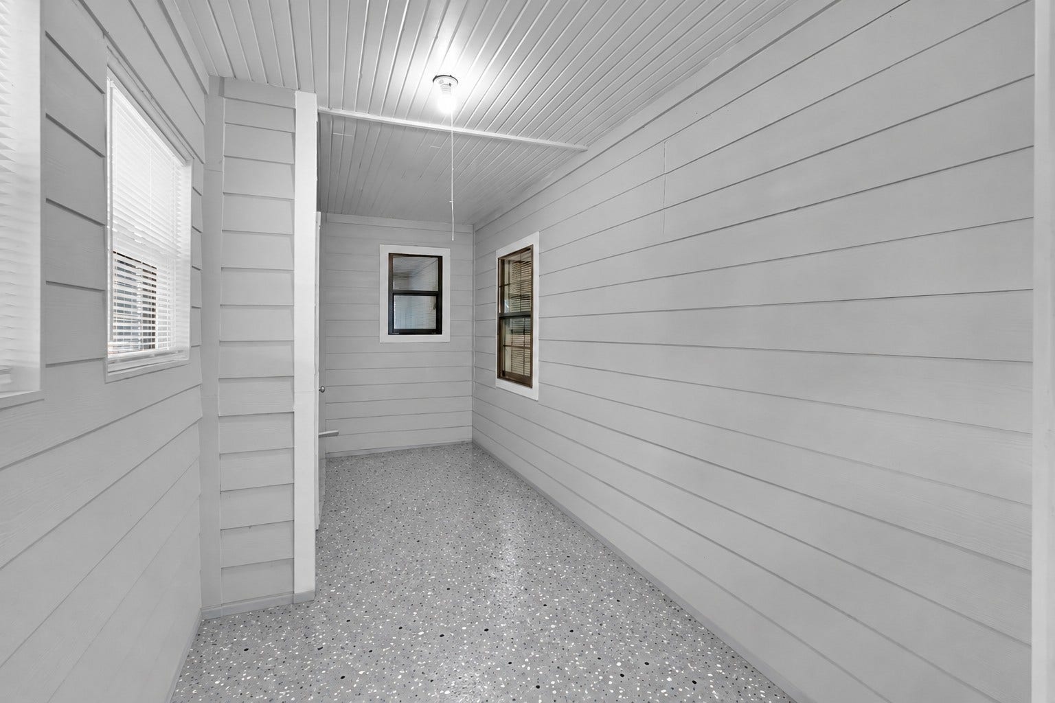 604 19th Avenue N, Texas City, TX 77590 Flex Room / Sunroom View: Accessible through French doors from the primary bedroom you will find this enclosed sunroom that offers additional flex space for relaxing, hobbies, storage, or a future sitting area.