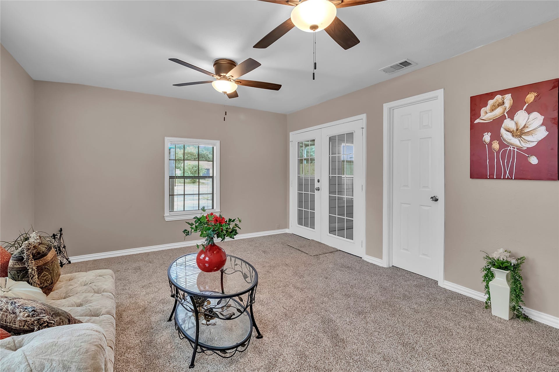 604 19th Avenue N, Texas City, TX 77590 Additional view of the spacious primary featuring French doors leading to the sunroom