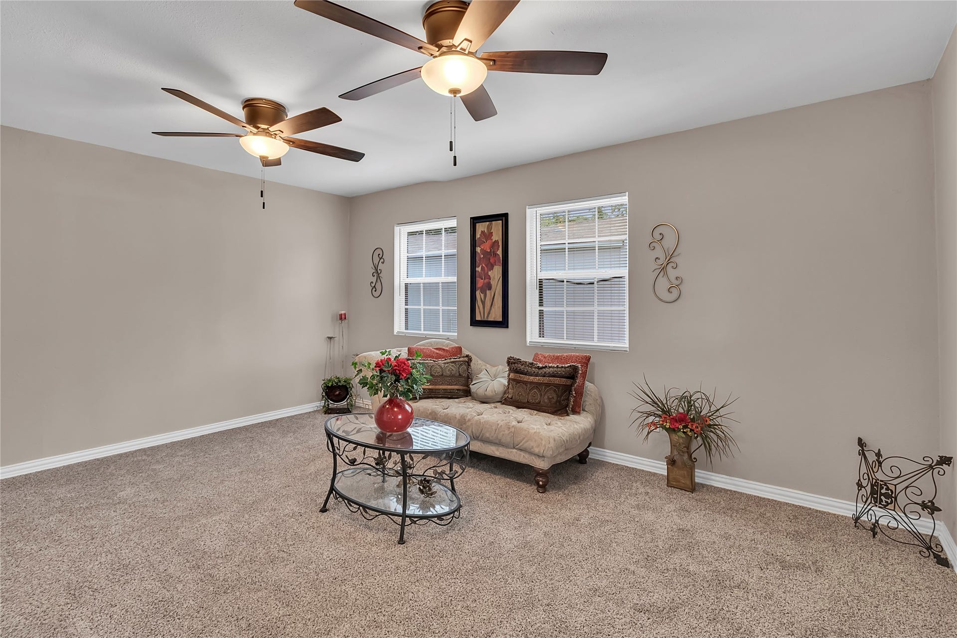 604 19th Avenue N, Texas City, TX 77590 Spacious primary with fresh carpet, abundant natural light, and dual ceiling fansperfect for relaxing after a busy day. This desirable split floor plan provides added privacy, with the primary suite thoughtfully separated from the secondary bedrooms.