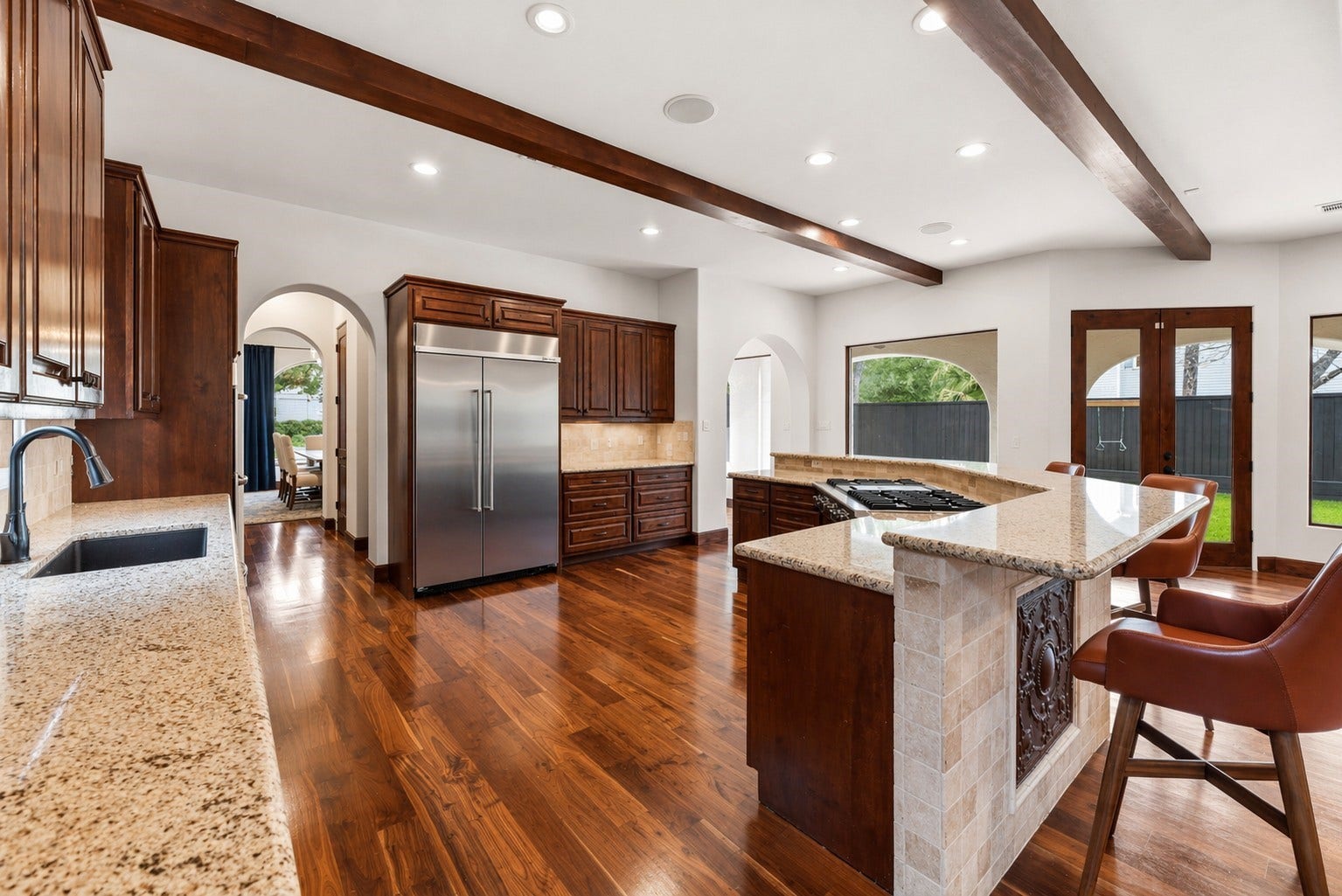 3803 Drake Street, Houston, TX 77005 Featuring stainless steel finishes, this kitchen layout prioritizes efficiency without compromising its high-end aesthetic. It is a versatile space designed to handle everything from daily routines to large-scale entertaining with ease.