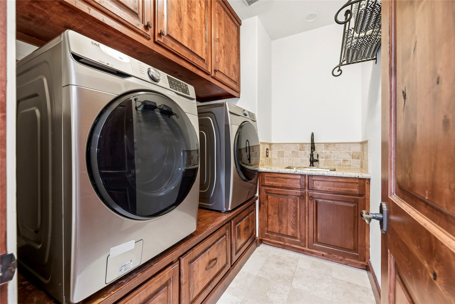 3803 Drake Street, Houston, TX 77005 Experience convenience with the in-house utility room, thoughtfully designed with a dedicated laundry area.