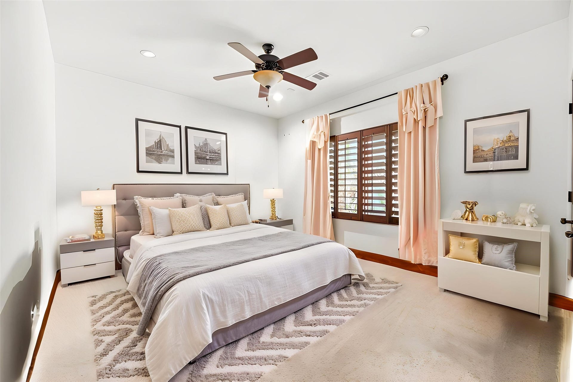 3803 Drake Street, Houston, TX 77005 This secondary bedroom offers a bright and airy feel, showcasing the home's efficient use of space and consistent design. Virtually staged.