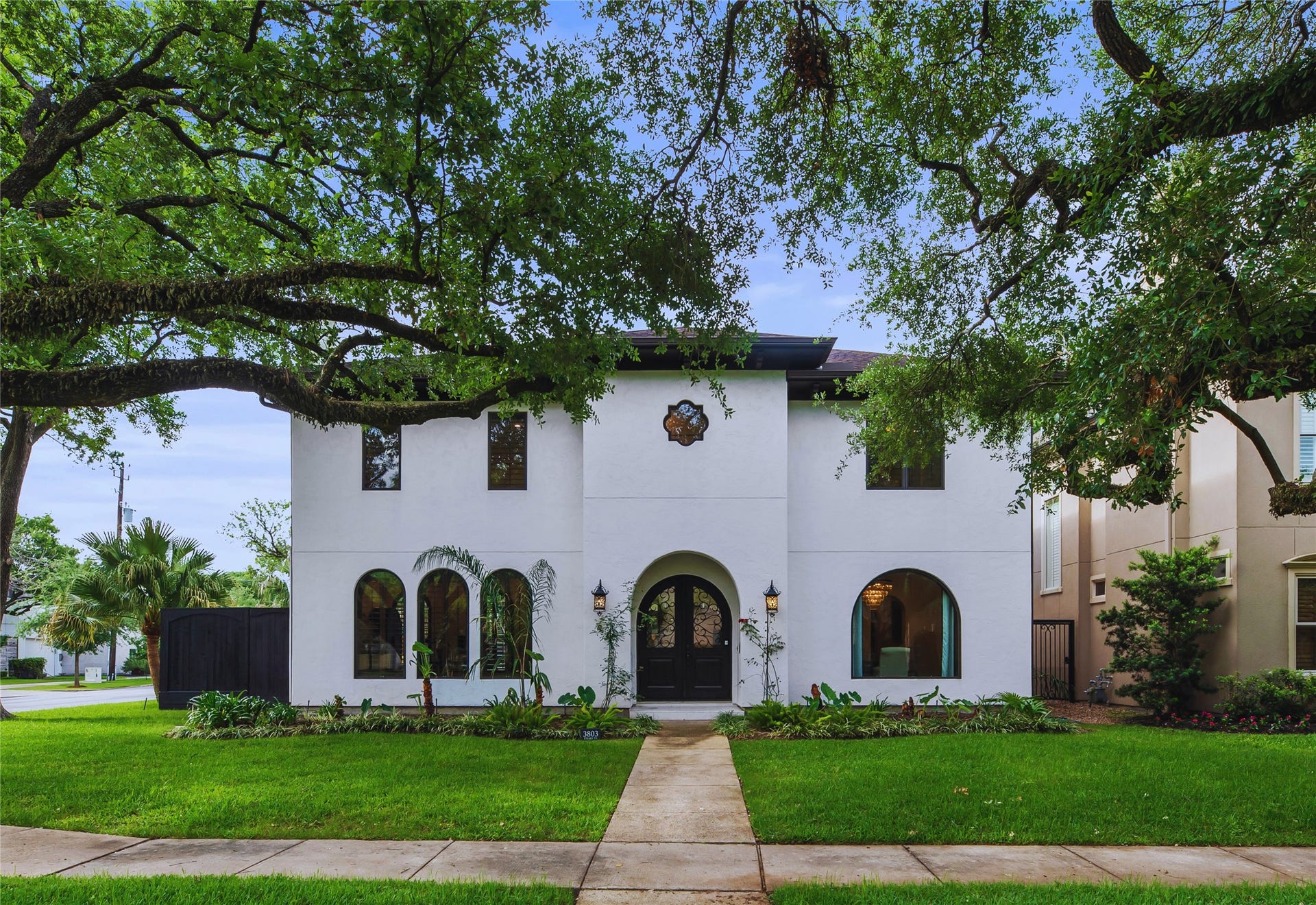 3803 Drake Street, Houston, TX 77005 Welcome to 3803 Drake St, a custom stucco masterpiece on a sprawling corner lot in Sunset Terrace. This refined estate features a secure auto driveway gate, an oversized garage, and two elegant gas fireplaces for a lifestyle of unparalleled comfort.