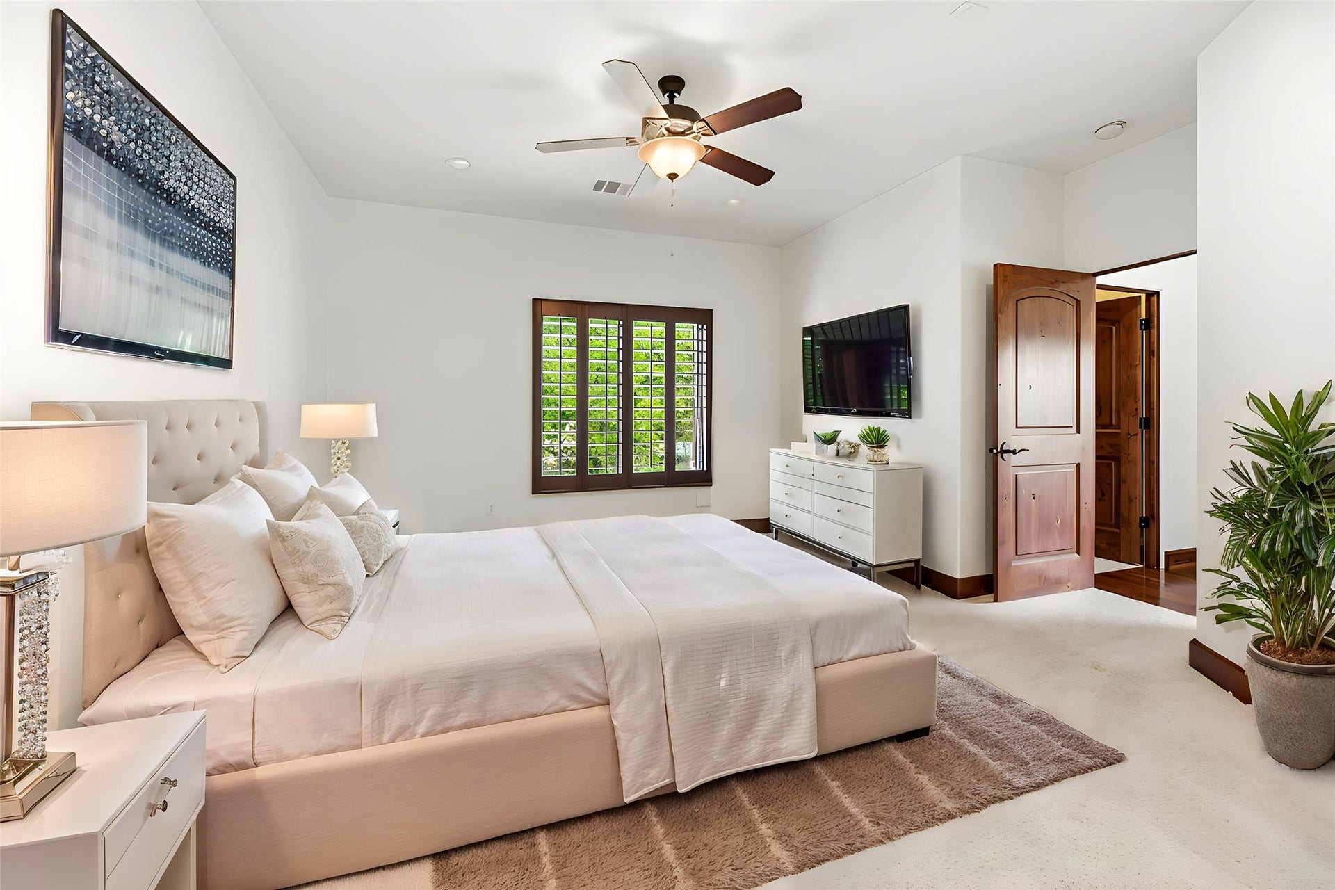 3803 Drake Street, Houston, TX 77005 Each bedroom is well-appointed with quality finishes and custom window treatments, maintaining the high-end feel found throughout the entire home. Virtually staged.