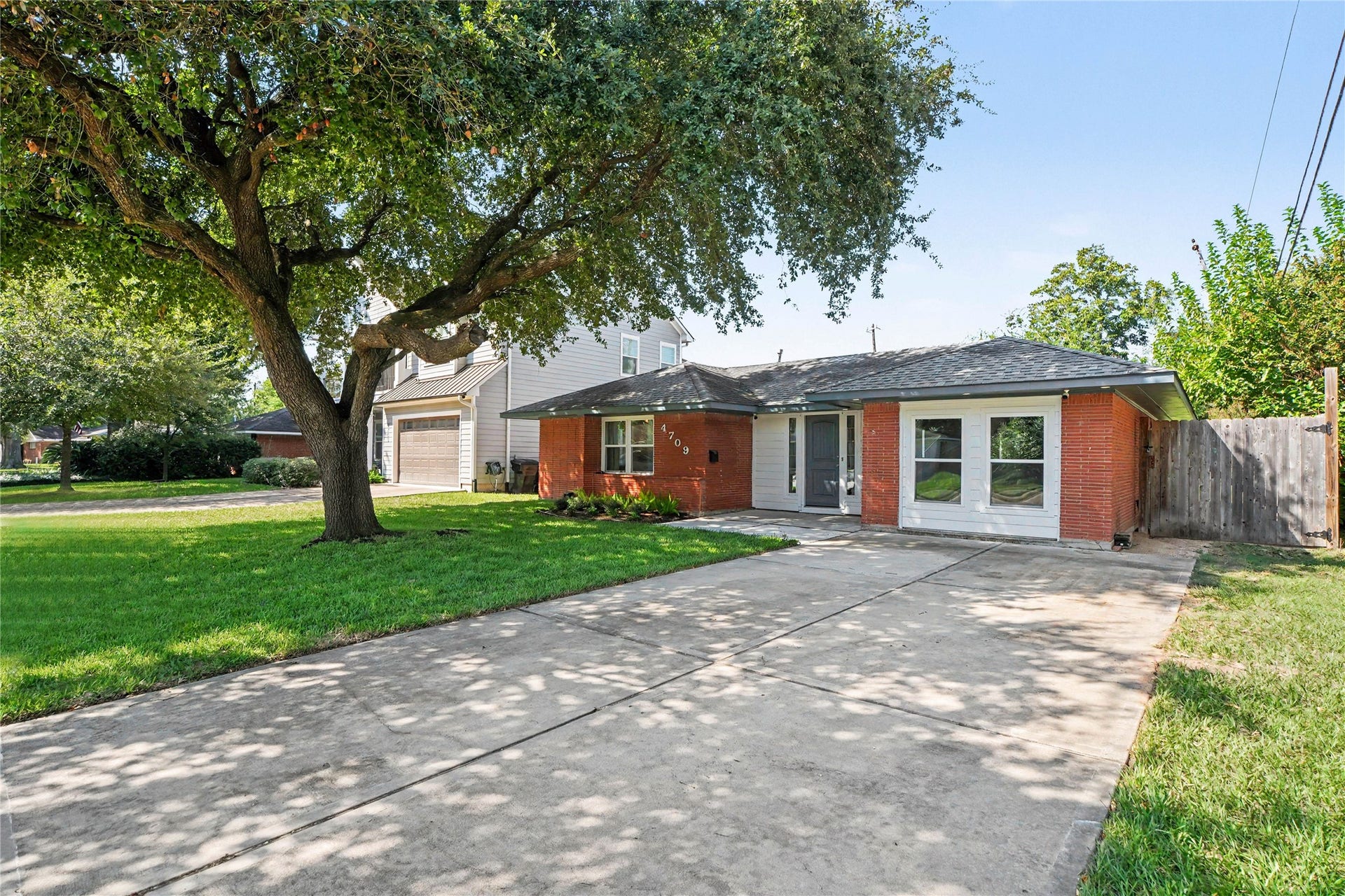 4709 Sanborn Drive, Houston, TX 77092 You don't get allot of double wide driveways or large entry porches but this one has them.