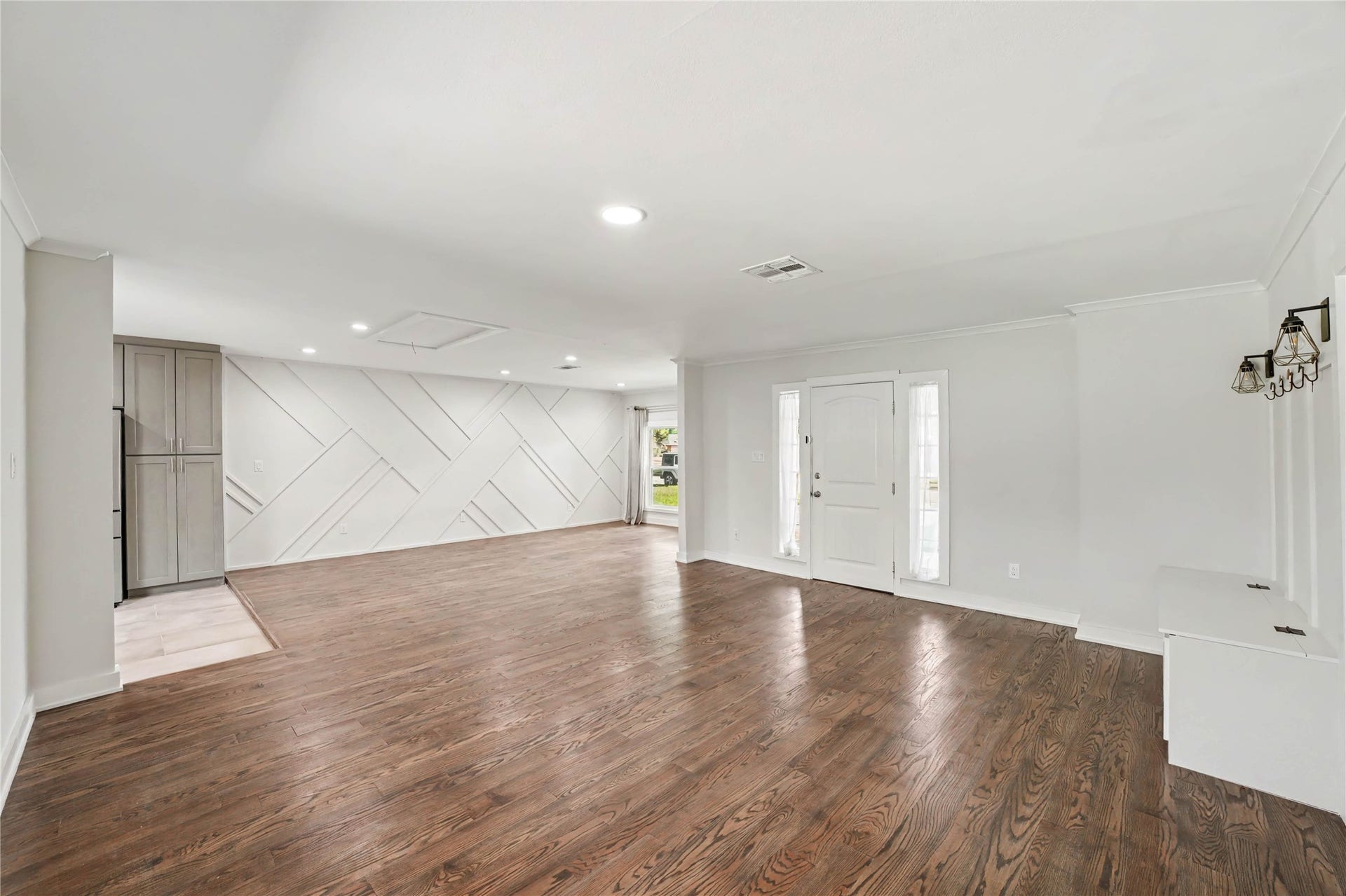 4709 Sanborn Drive, Houston, TX 77092 From the other side of the room, you have the kitchen on the left, then the dining room and then the entry and living area. Wide open space to do as you please.