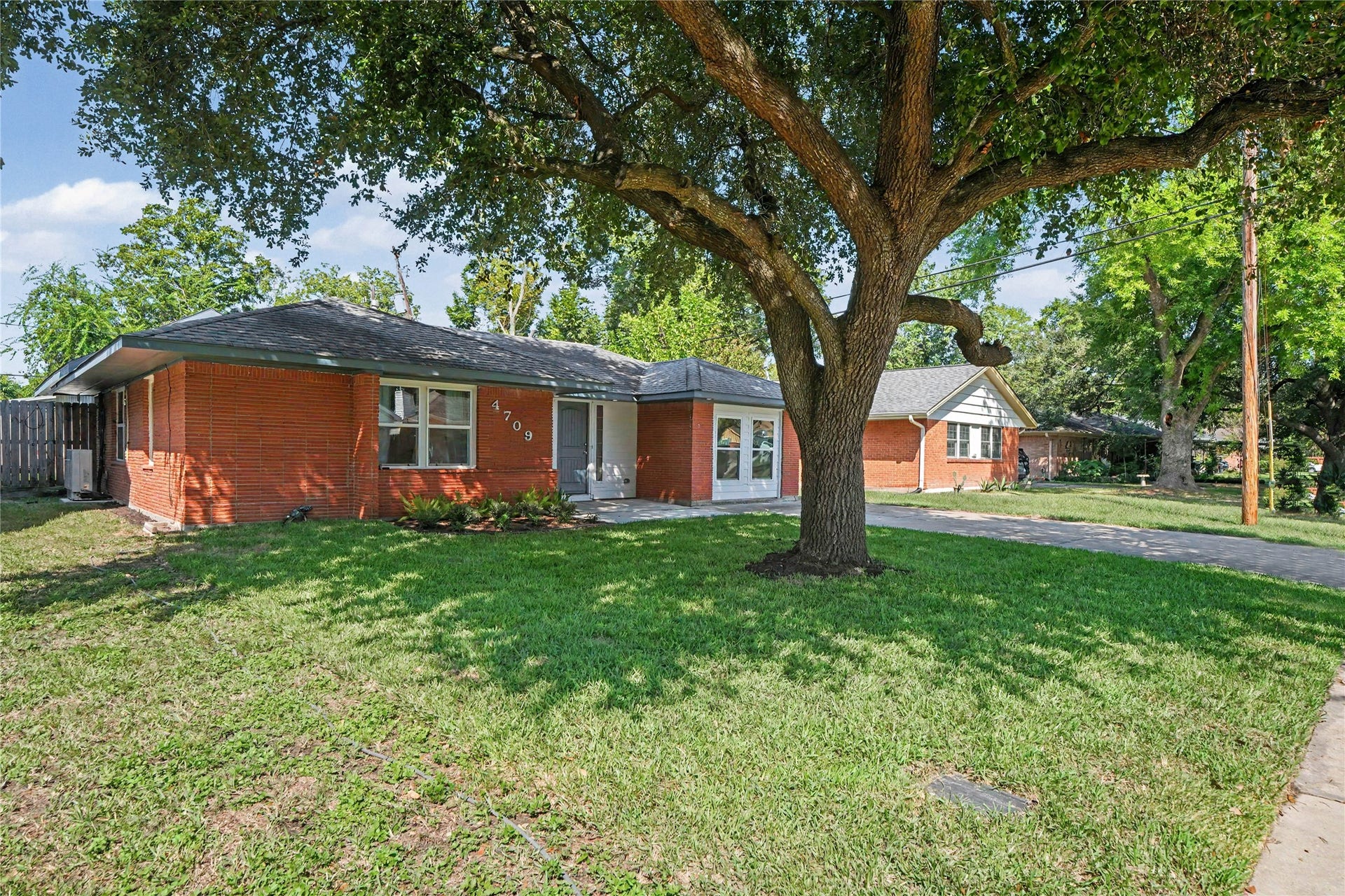 4709 Sanborn Drive, Houston, TX 77092 The home faces east and has a lovely vintage oak begging for a tree swing.