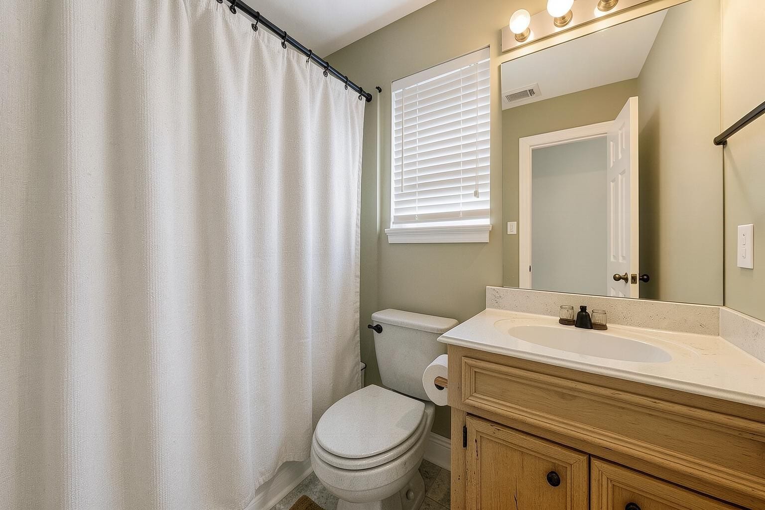 4907 Cambridge Street, Sugar Land, TX 77479 The other secondary bathroom has a shower/tub combo. Virtually remodeled.