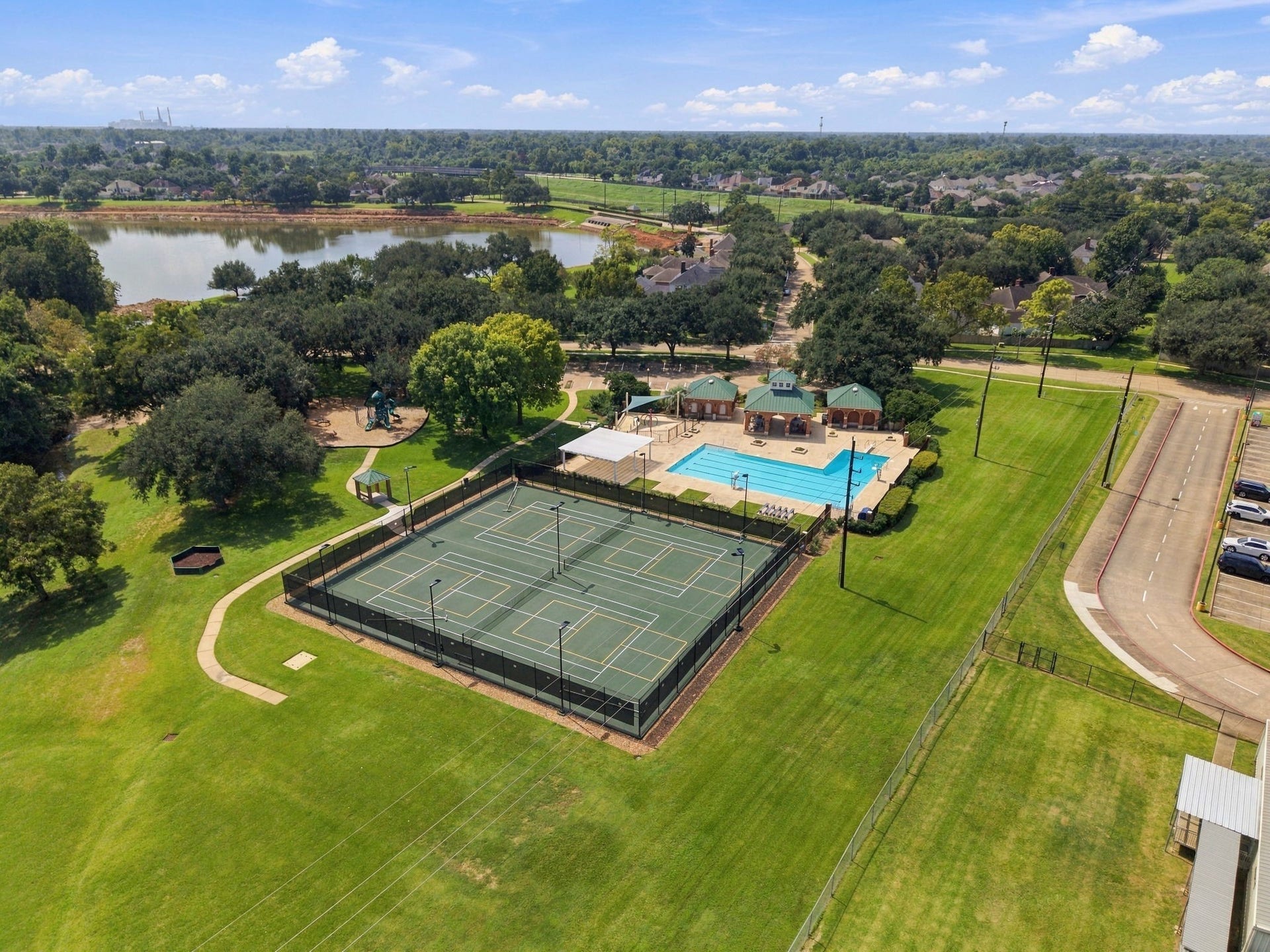 4907 Cambridge Street, Sugar Land, TX 77479 Enjoy the amenities a short walk away. The large lap pool and multiple tennis courts offer variety of activities, and a park nearby is perfect for the kids!