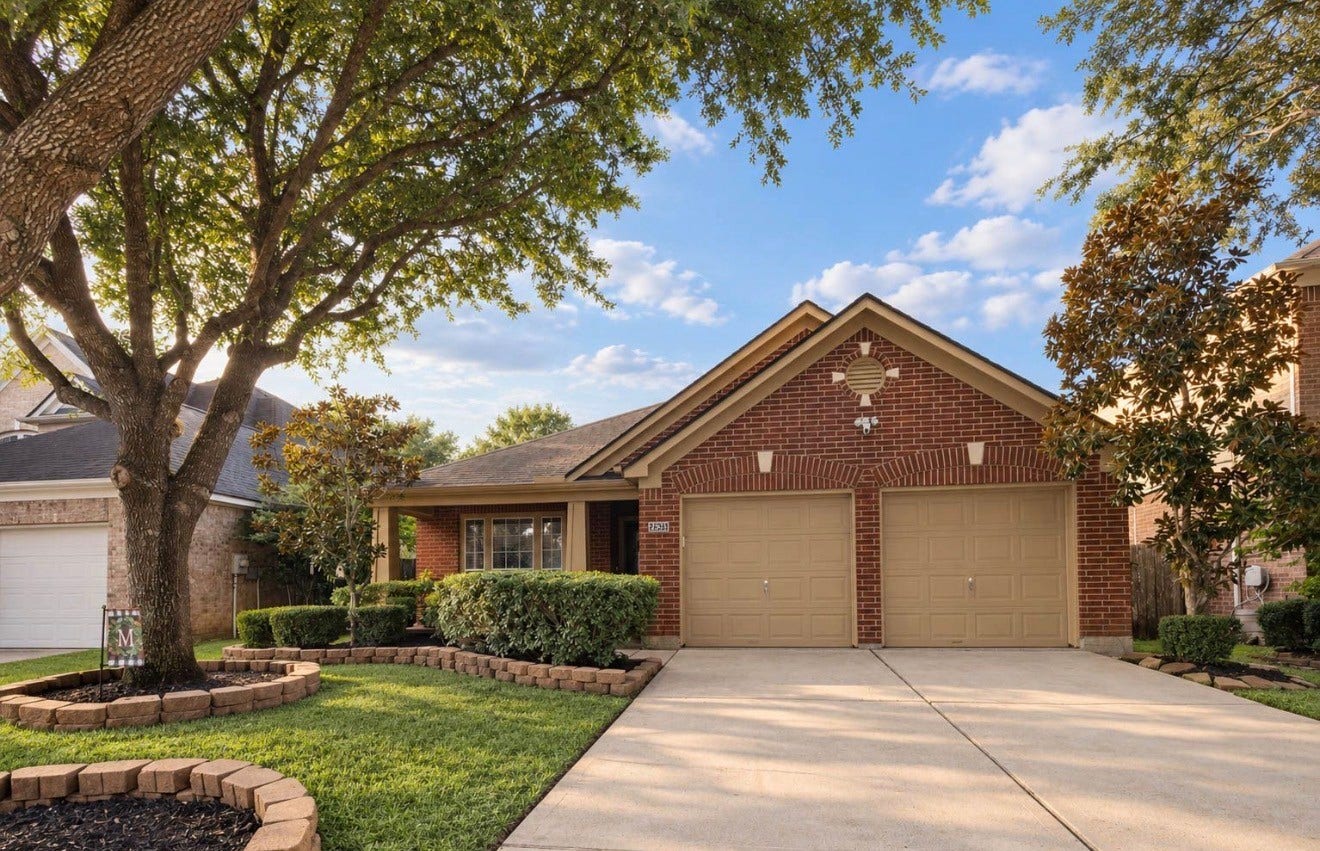 28231 Crossprairie Drive, Katy, TX 77494 Charming brick exterior with mature shade tree & manicured landscaping