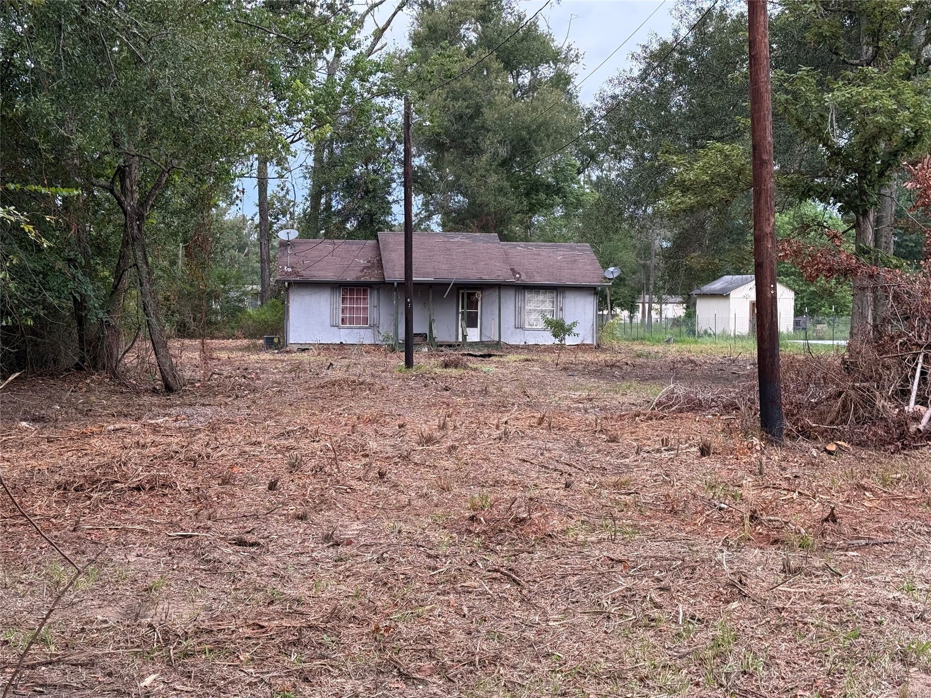 26331 Long Street, Splendora, TX 77372 Cleared 0.92-acre homesite in Patton Village with existing structure.