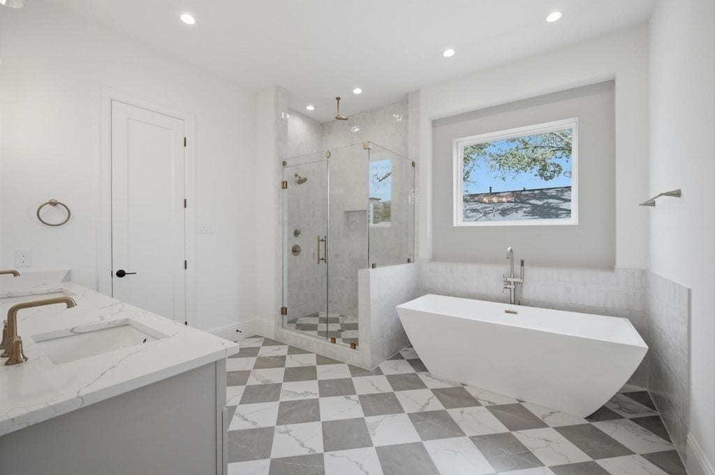 1320 Alexander Street, #A, Houston, TX 77008 Primary bathroom offers a walk-in shower and stand alone soaking tub