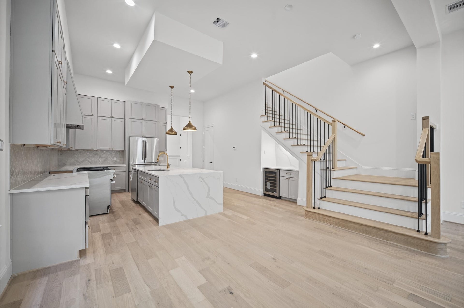 1320 Alexander Street, #A, Houston, TX 77008 Open-concept layout offers a seamless transition from the living area to the kitchen.