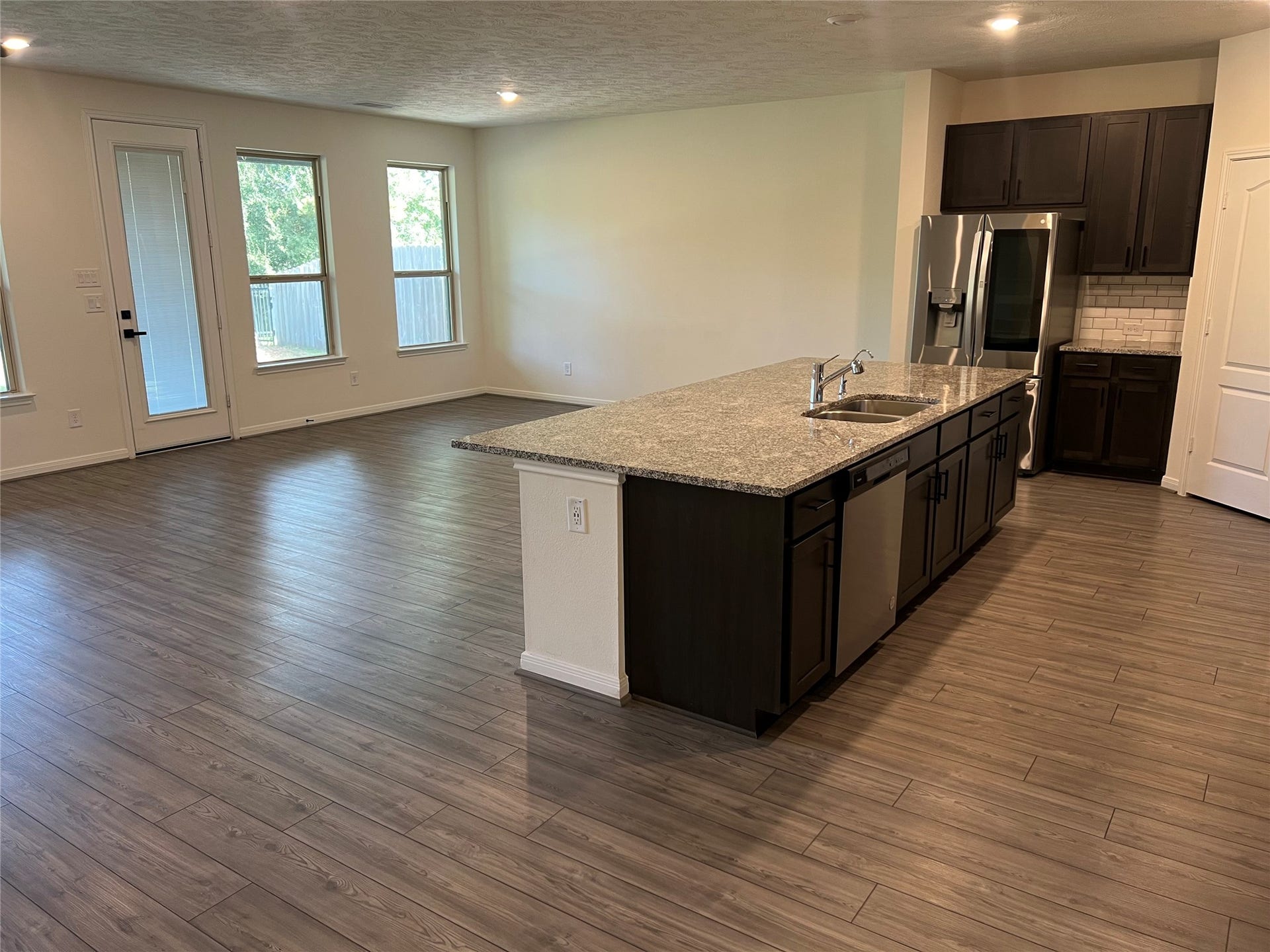 10735 Soaring Legend Lane, Humble, TX 77338 Open concept kitchen with oversized island
