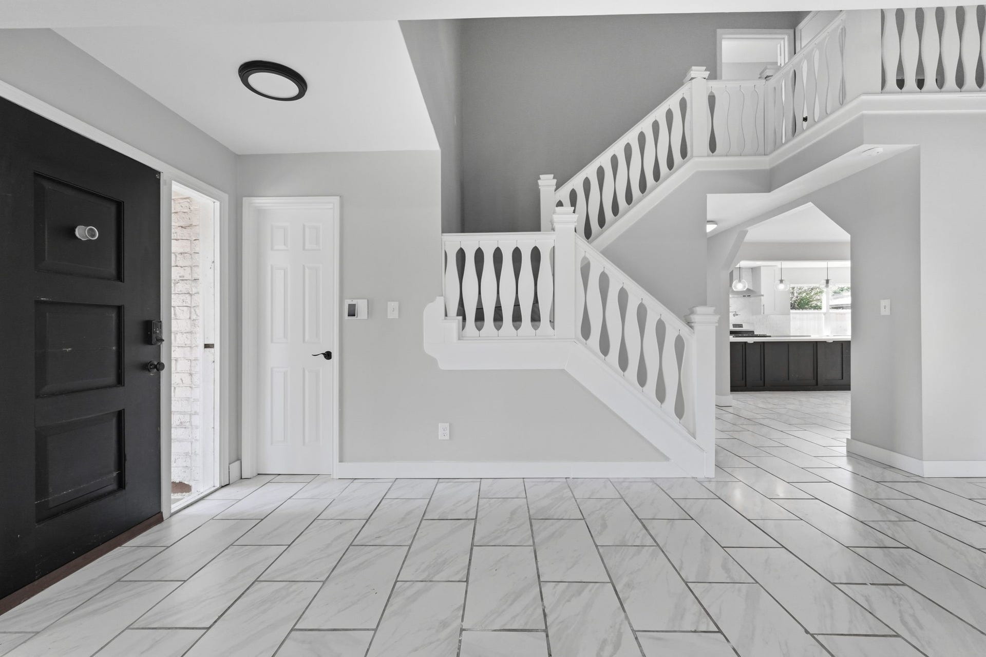 The stair case is conveniently located in the house for easy access between stories.