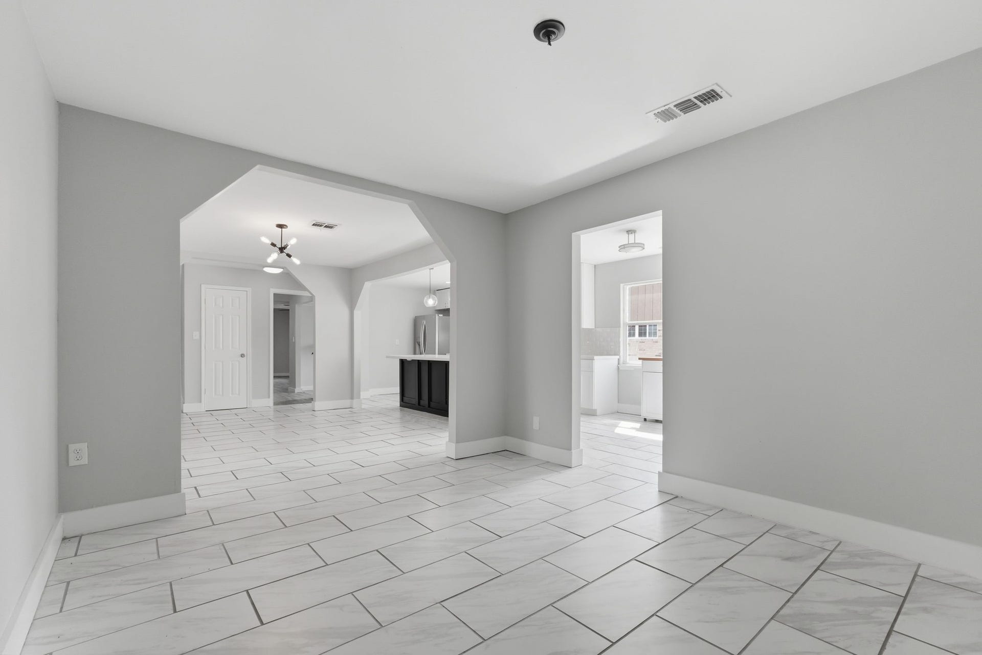 The open-concept dining area seamlessly connects to the kitchen for easy entertaining.