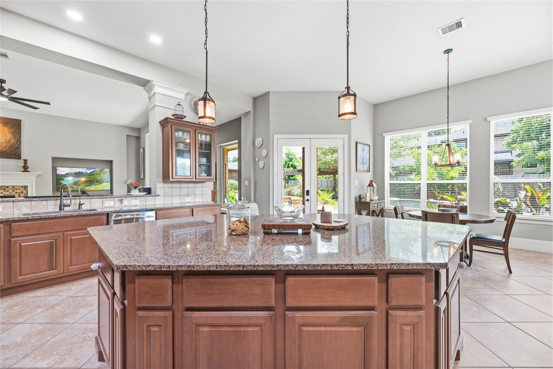 6115 Duke Trail Lane, Sugar Land, TX 77479 oversized kitchen island offering an abundance of space.