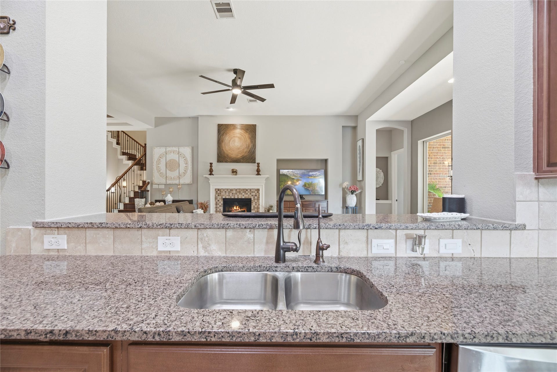 6115 Duke Trail Lane, Sugar Land, TX 77479 Never miss out on the action with this semi-open concept.