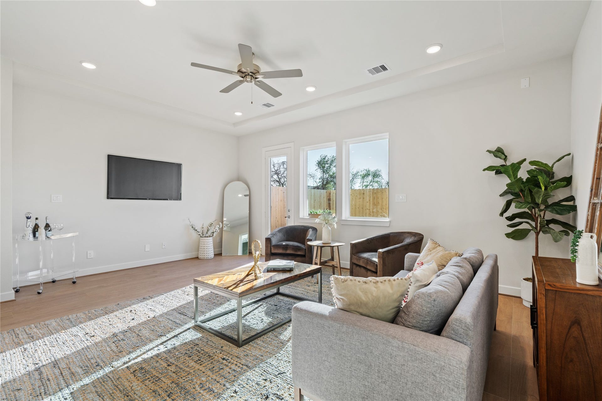 6441 Rena Street, Houston, TX 77092 Flexible media wall with enough room on either side gives you options for how you arrange and anchor the living space.