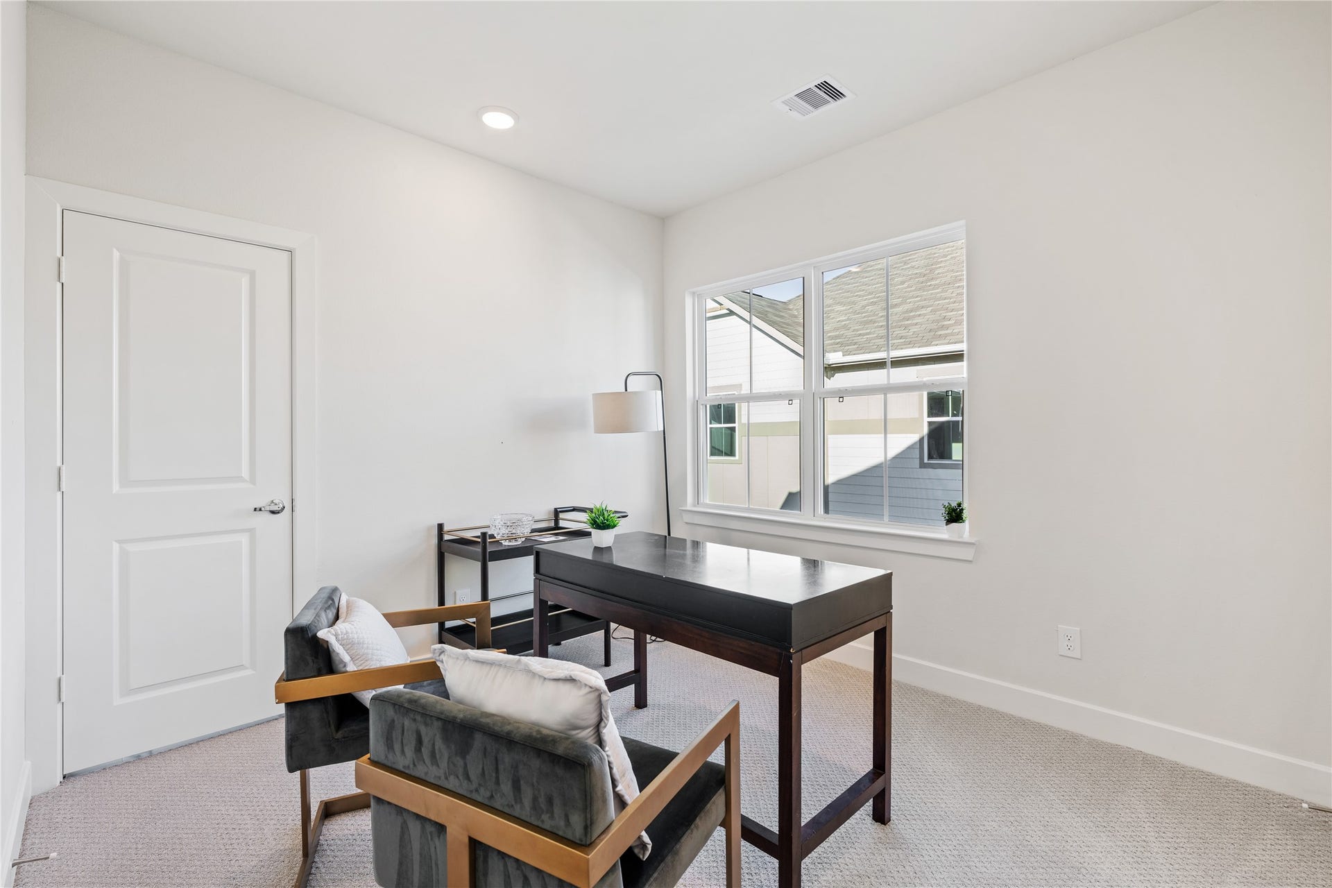 6441 Rena Street, Houston, TX 77092 Secondary bedroom with a rear-facing window and enough square footage to work as a home office, guest room, or both.