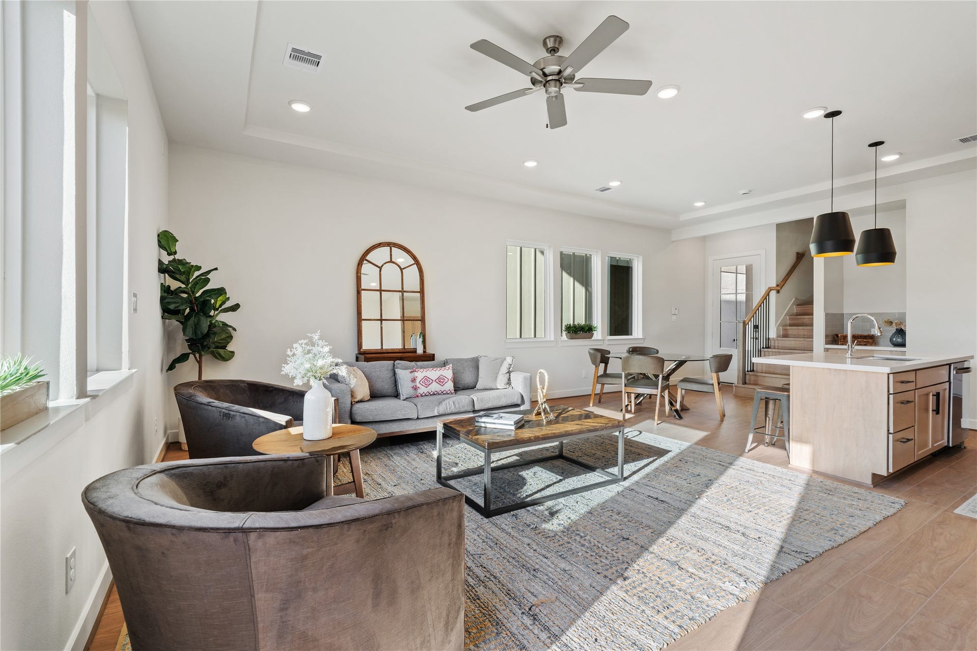 6441 Rena Street, Houston, TX 77092 Natural light pulls across the living area from the front windows all the way through to the kitchen, keeping the whole level feeling open.