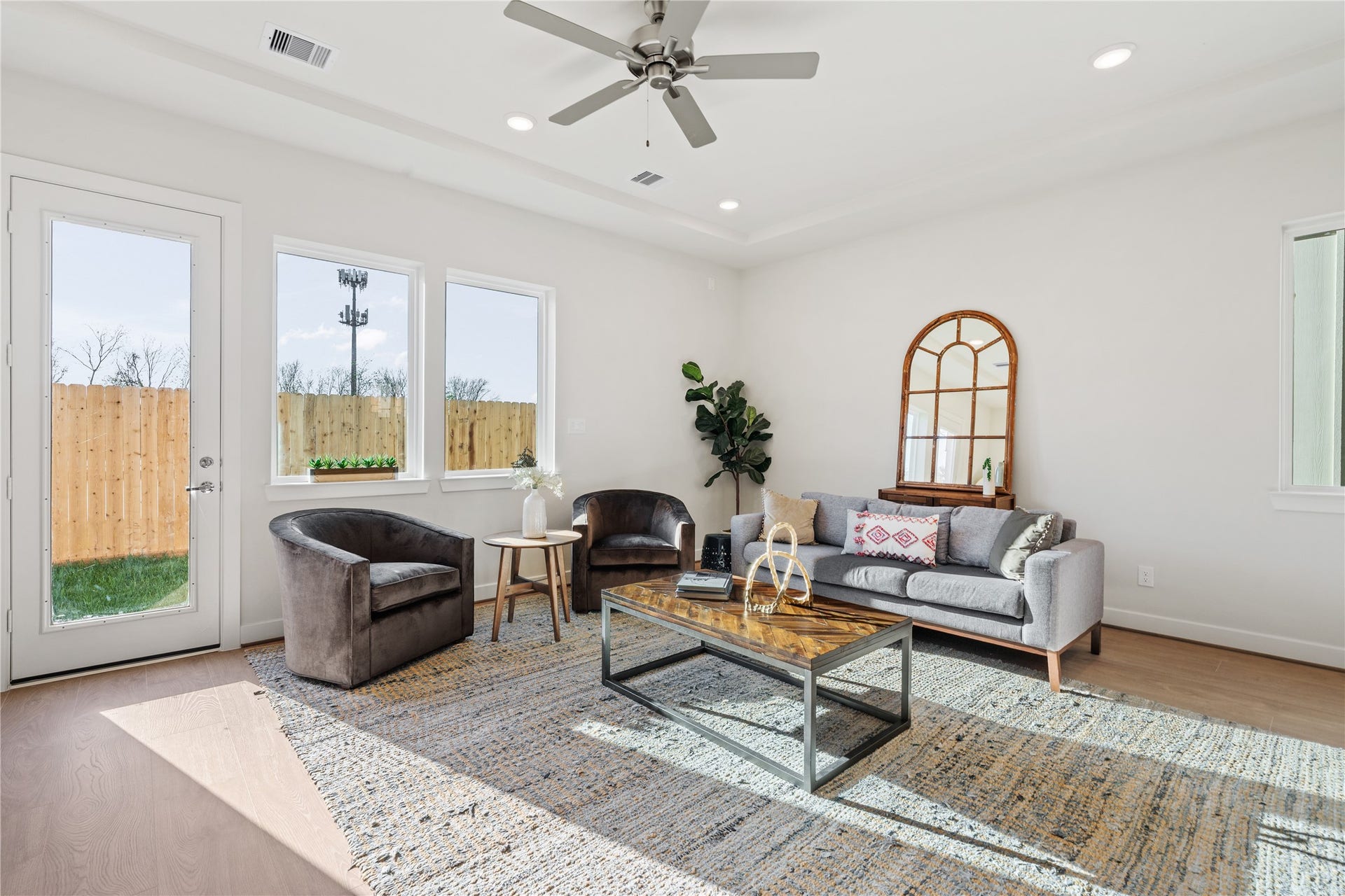 6441 Rena Street, Houston, TX 77092 Glass patio doors off the living area connect directly to the backyard, keeping indoor and outdoor in easy reach of each other.