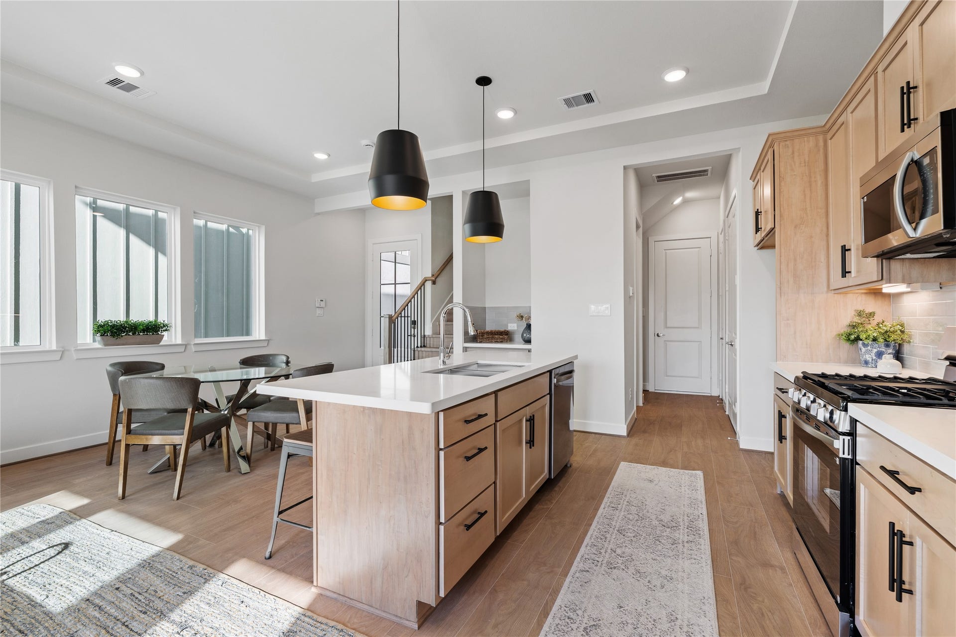 6441 Rena Street, Houston, TX 77092 Smart layout with ample prep space and clear sightlines across the island into the dining area, keeping the cook connected to the room.